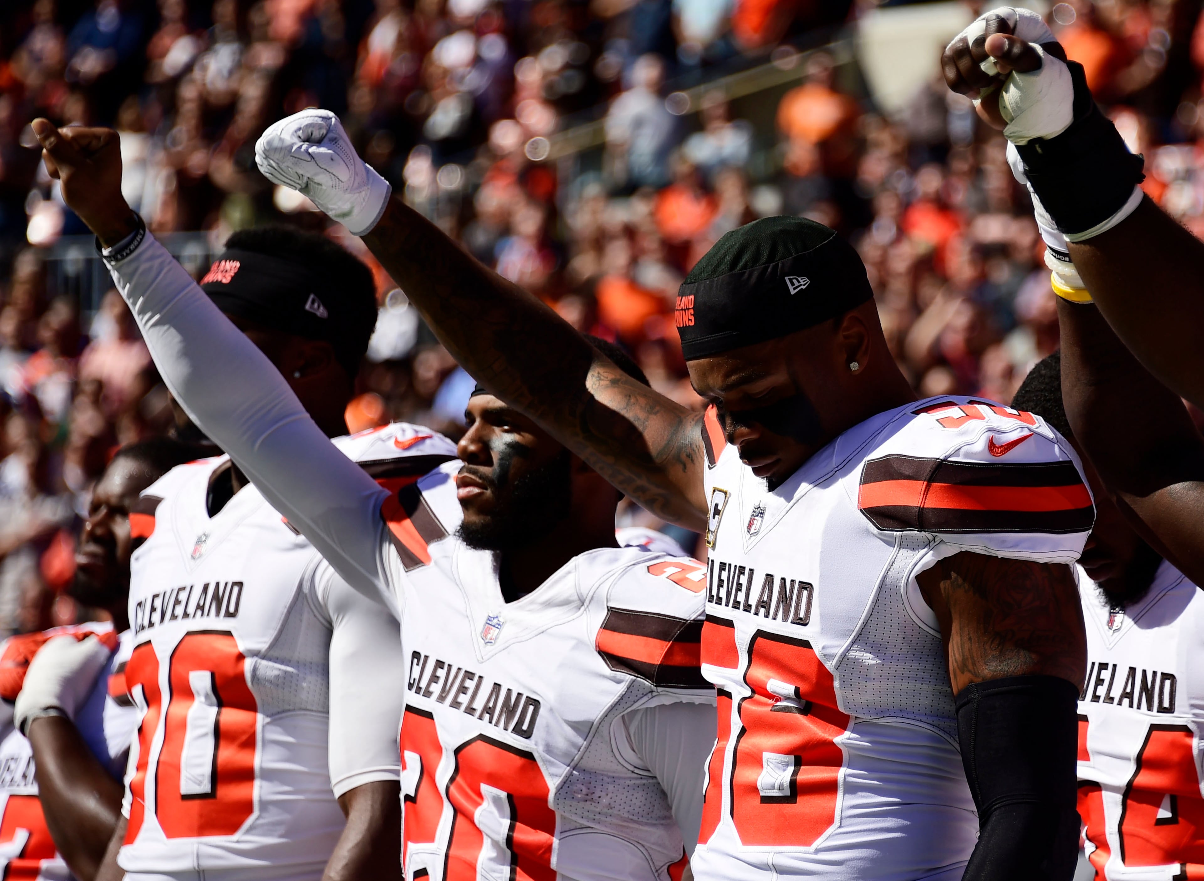CLEVELAND, OH - OCTOBER 01: Briean Boddy-Calhoun #20 and Christian Kirksey #58 of the Cleveland Browns hold their fists in the air during the National Anthem before the game against against the Cincinnati Bengals at FirstEnergy Stadium on October 1, 2017 in Cleveland, Ohio. (Photo by Jason Miller /Getty Images)