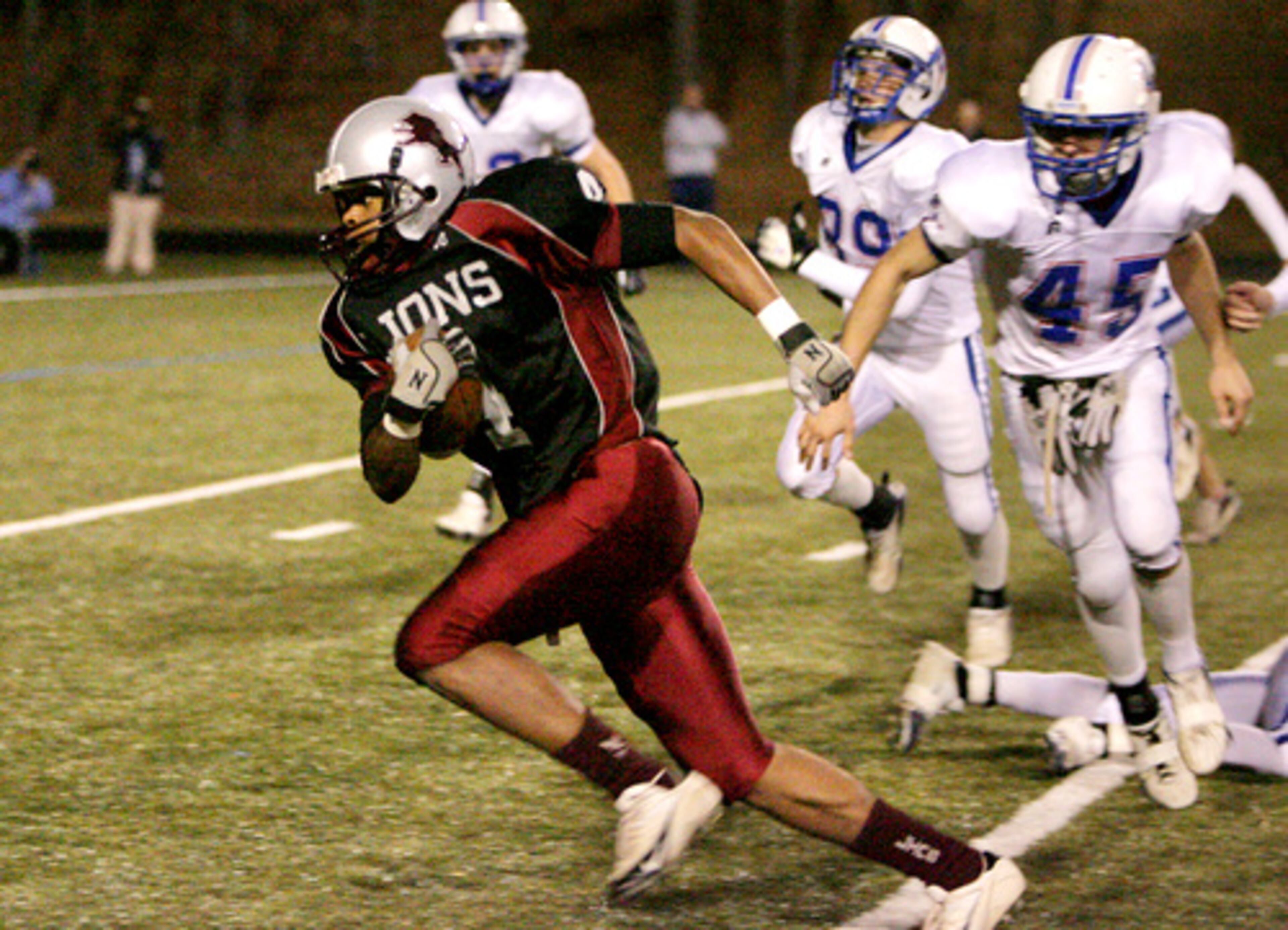 MLK wideout Daniel McKayahan runs in for the Lions' second score against Walton.
