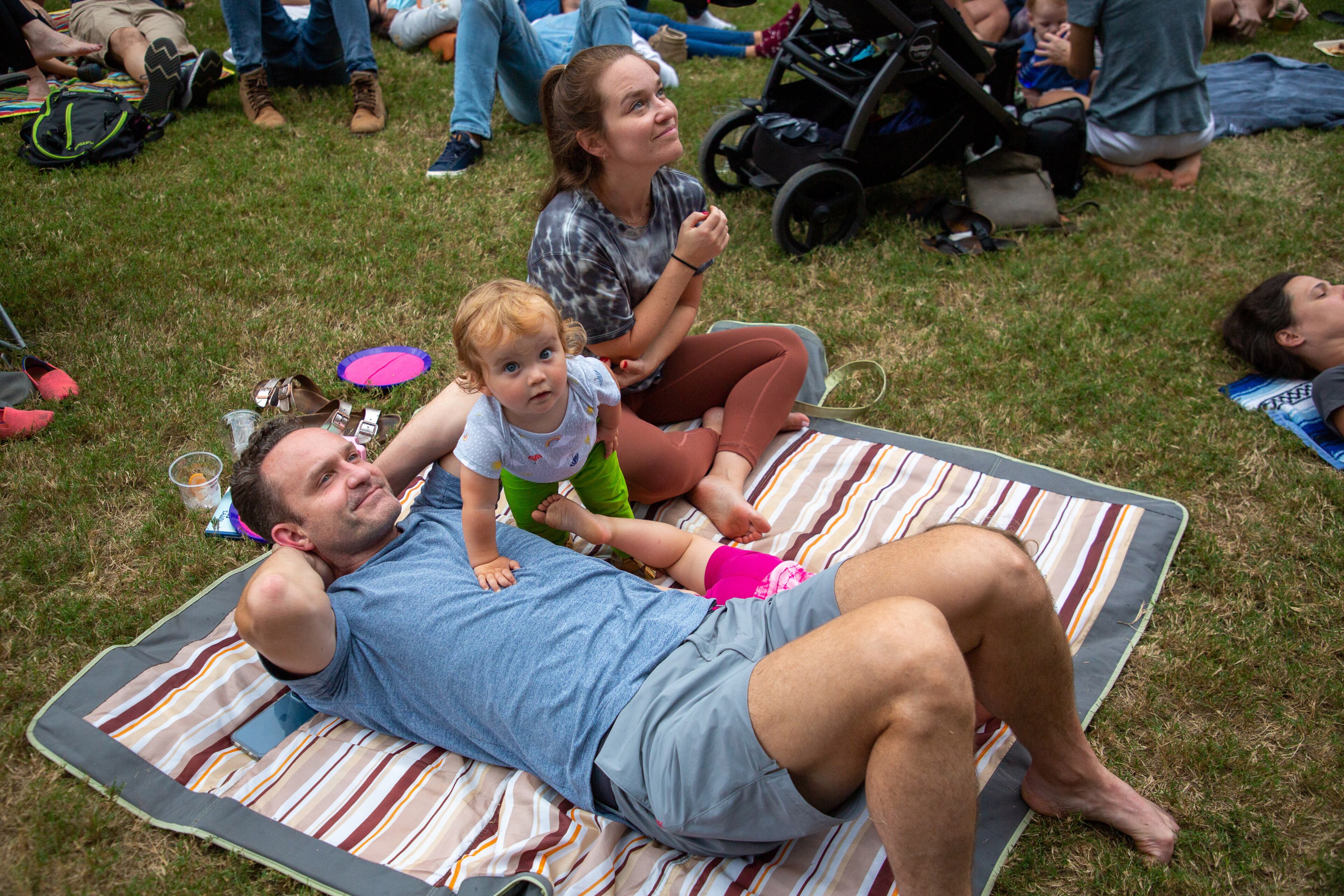 People watch the Bandaloop dancers perform on the side of a building facing the Atlanta Beltline on Sunday, October 3, 2021. (Photo: Steve Schaefer for The Atlanta Journal-Constitution)