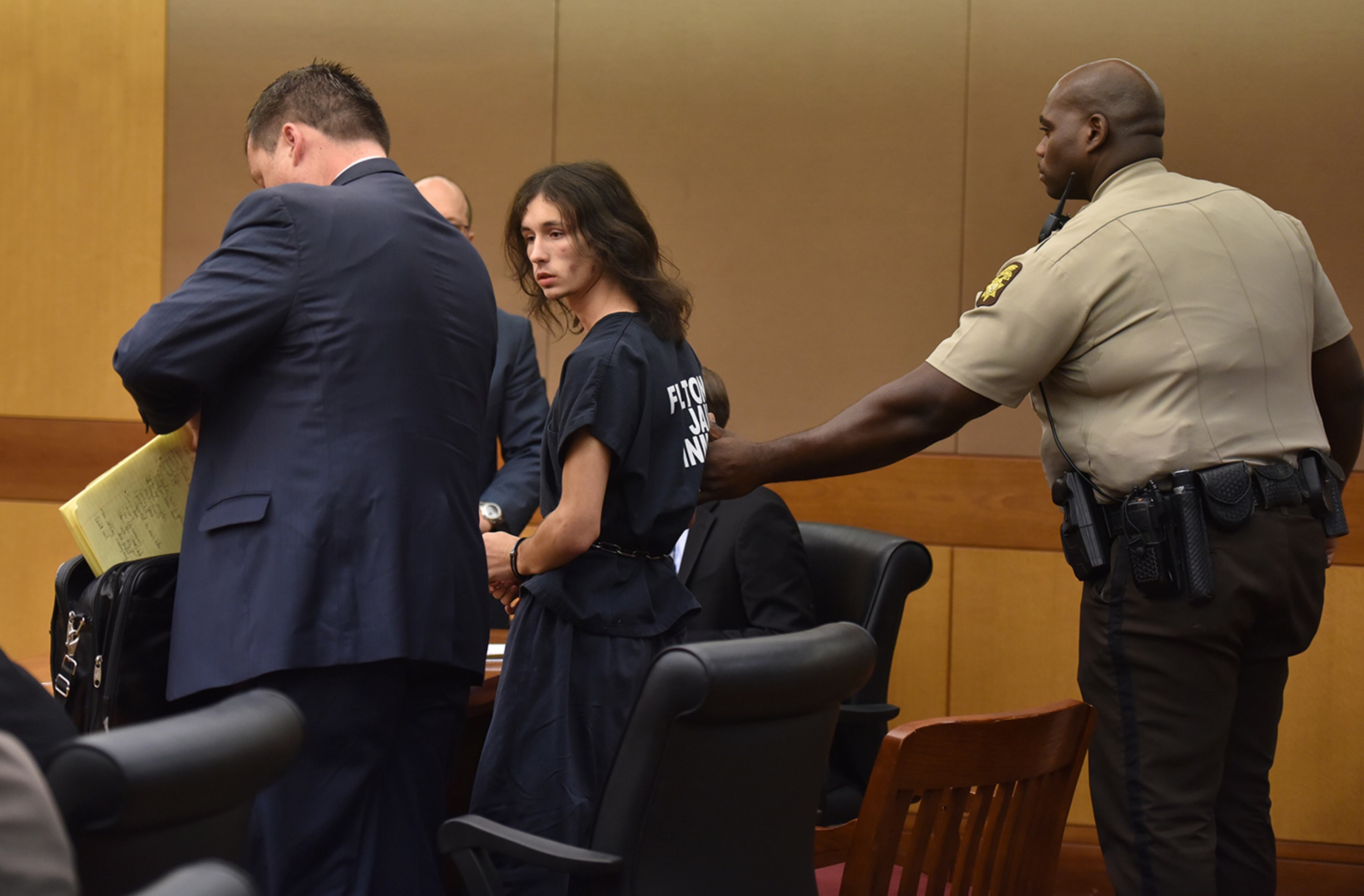 Jeffery Hazelwood is escorted from court following his probable cause hearing Friday August 19, 2106. (BRANT SANDERLIN/BSANDERLIN@AJC.COM)