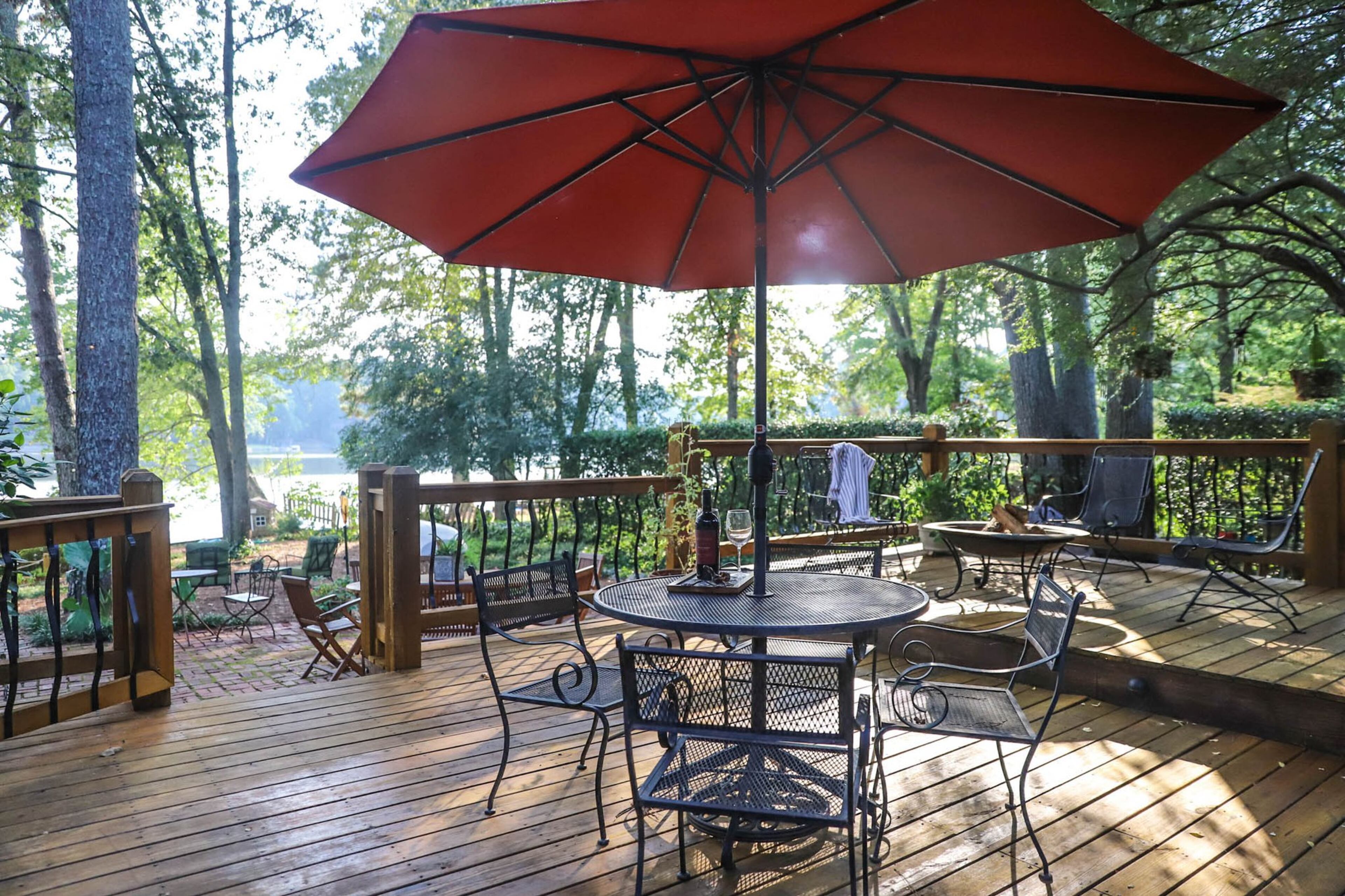 The largest of three decks in Megan and David Sellers’ back yard leads from inside the lake room to the brick patio below. With surround sound and doors that open up all along the back of the house, the Sellers comfortably host gatherings of 30 or more people. Text by Shannon Dominy. Photo by Reynolds Rogers.
