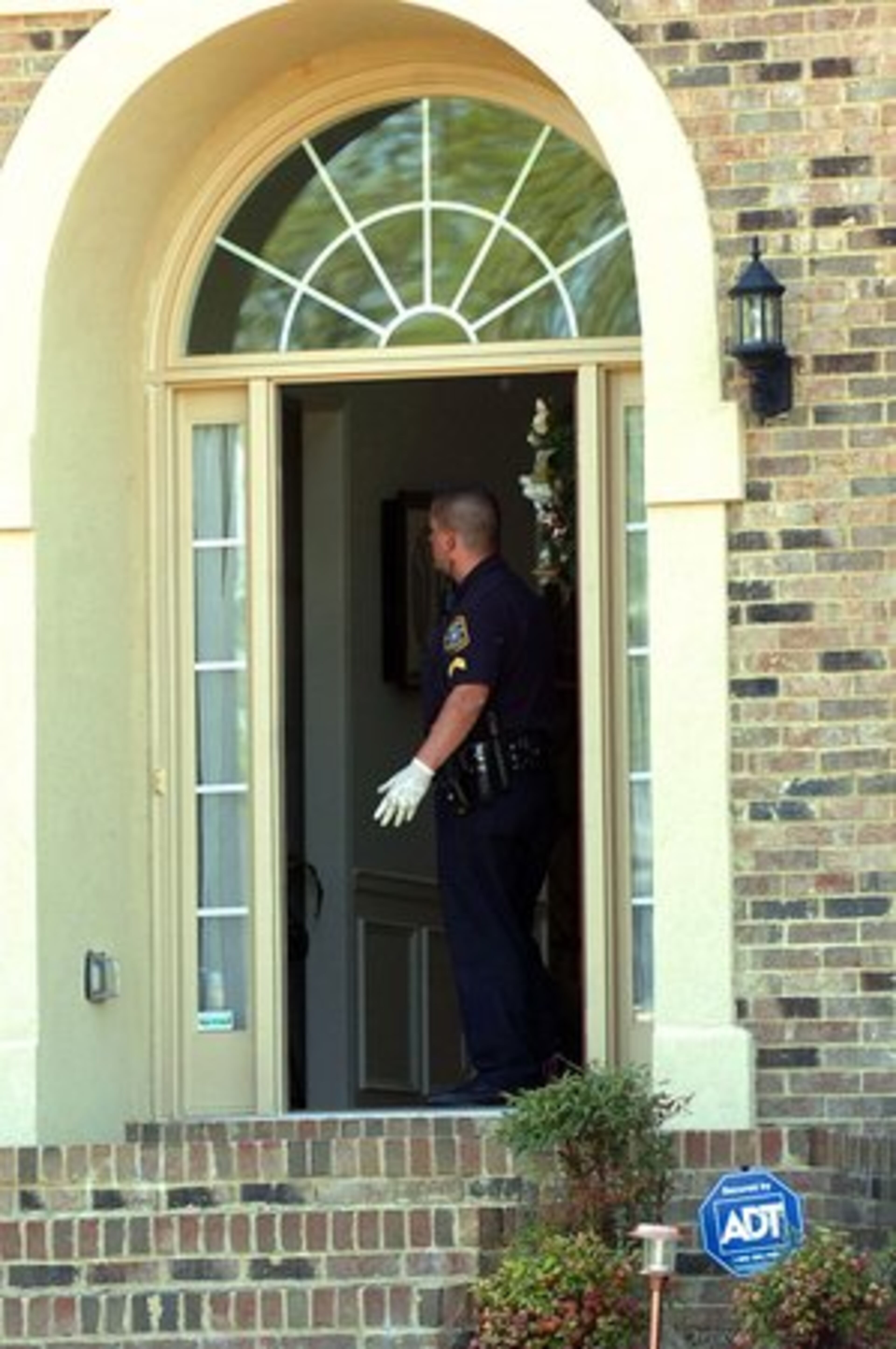 Police searched the garage and the house.