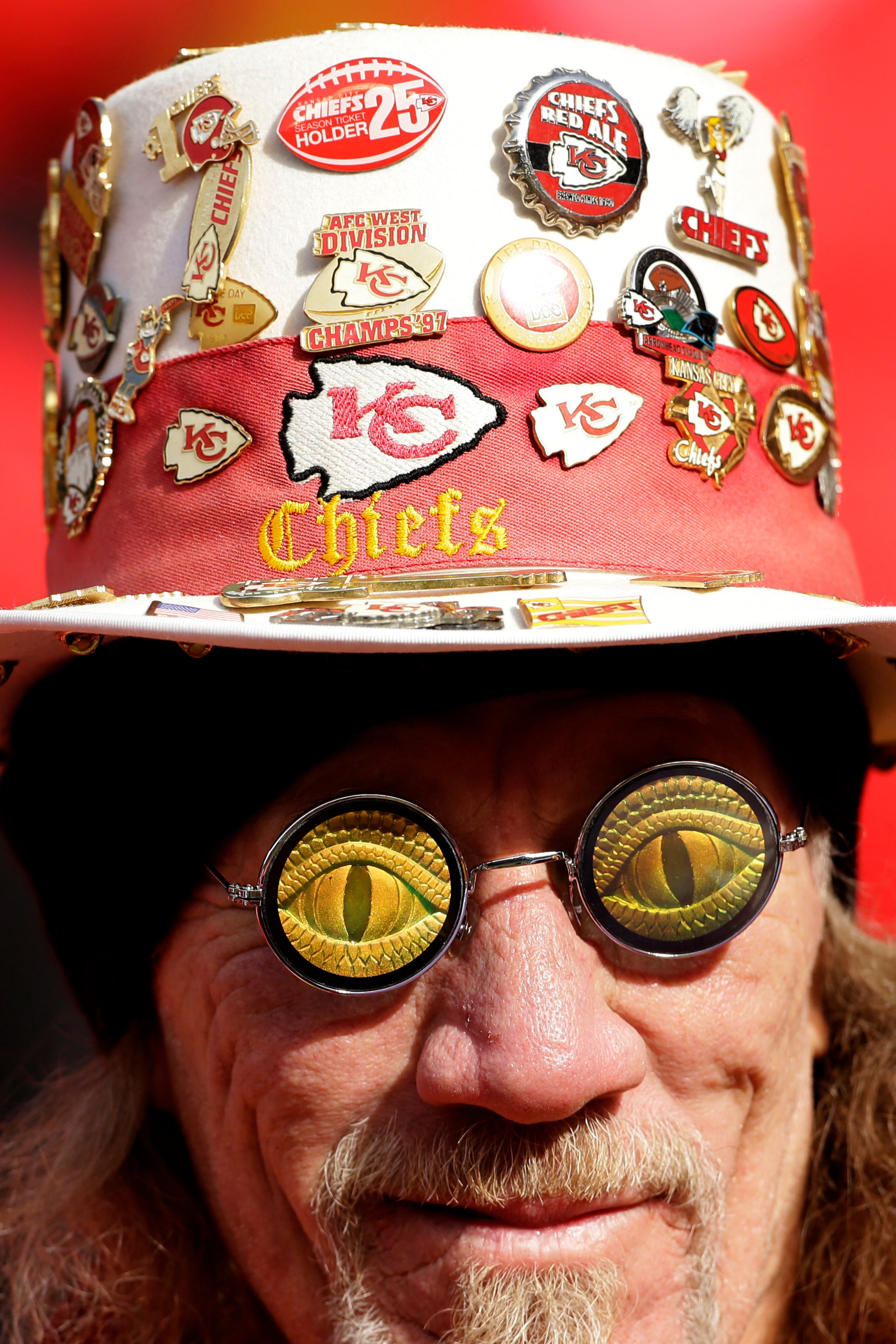 A Kansas City Chiefs fan watches during the first half of an NFL football game against the San Diego Chargers Sunday, Nov. 24, 2013, in Kansas City, Mo. (AP Photo/Charlie Riedel)