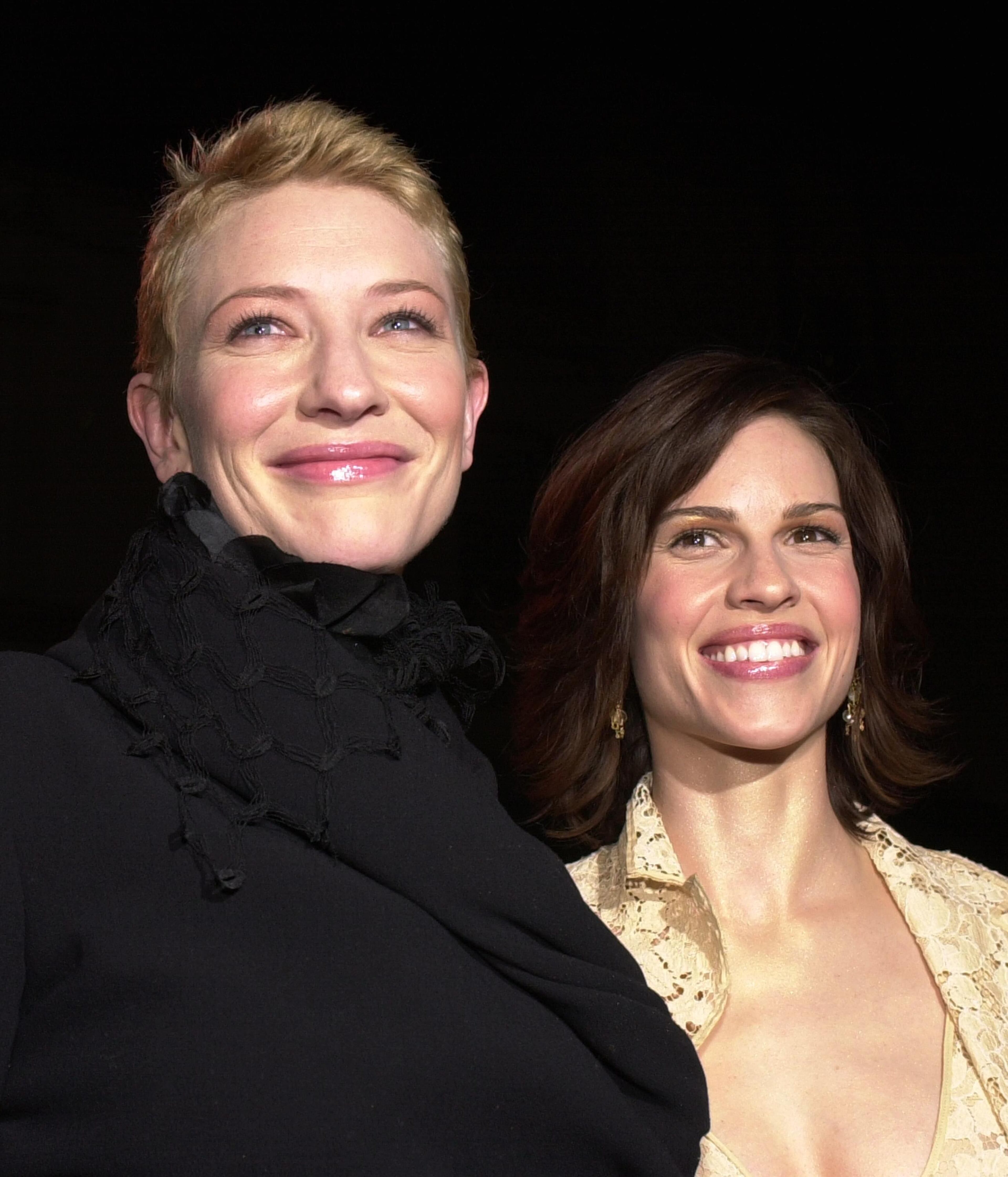 383425 05: Actresses Cate Blanchett, left, and Hilary Swank arrive at the premiere of Paramount Classics'' "The Gift" December 18, 2000 at the Paramount Theatre in Hollywood, CA. (Photo by Chris Weeks/Liaison)
