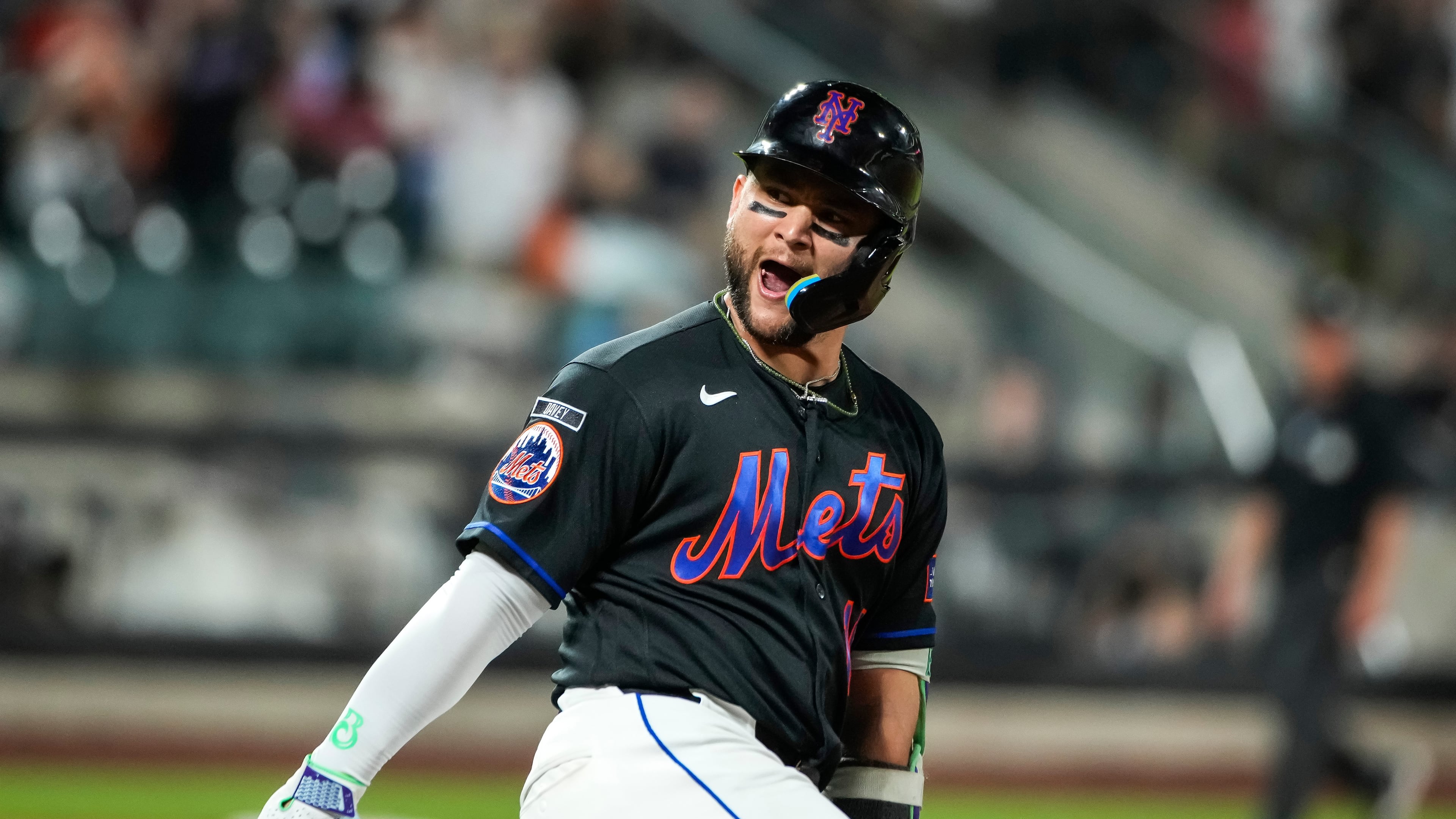 New York Mets' Bo Bichette (19) celebrates a solo home run during the second inning of a baseball game against the Atlanta Braves, Friday, June 12, 2026, in New York. (AP Photo/Eduardo Munoz Alvarez)