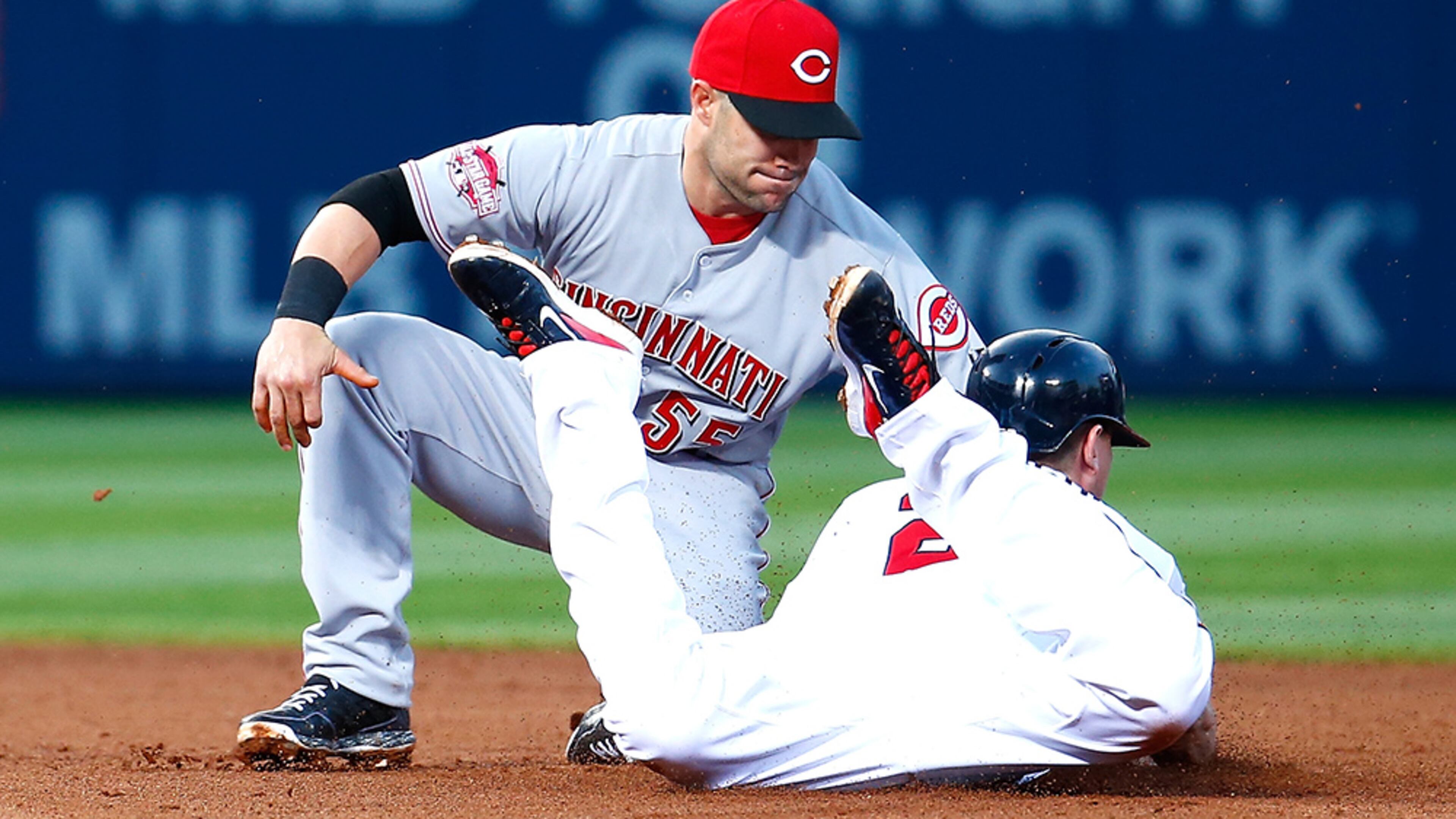Braves third baseman Chris Johnson is caught stealing second base by Reds' Skip Schumaker in the fourth inning at Turner Field Thursday, April 30, 2015, in Atlanta.