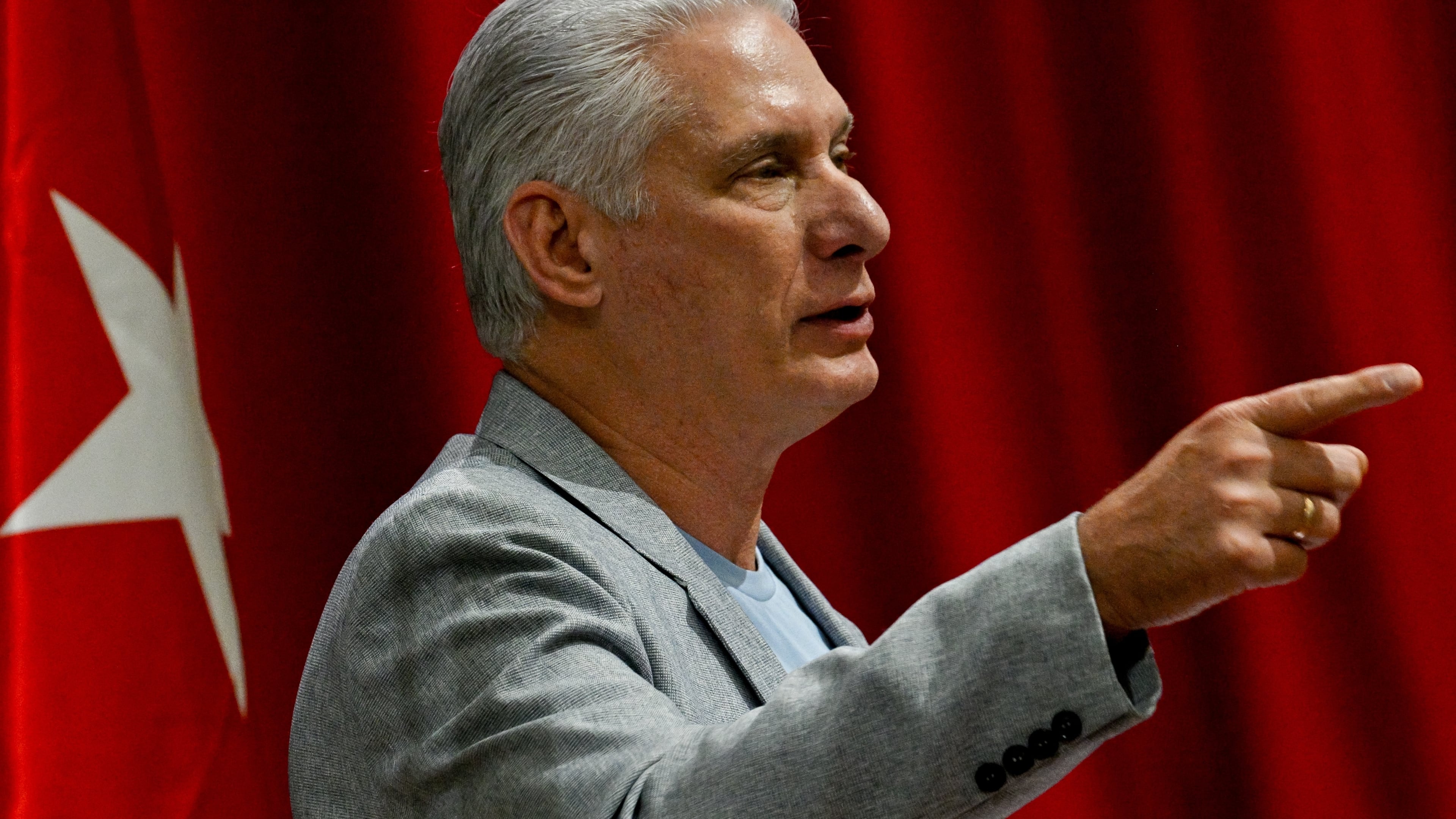 Cuban President Miguel Diaz-Canel delivers a welcome speech to participants of the "Nuestra America," or Our America Convoy at the Convention Palace in Havana, Cuba, Friday, March 20, 2026.(Adalberto Roque/Pool Photo via AP)