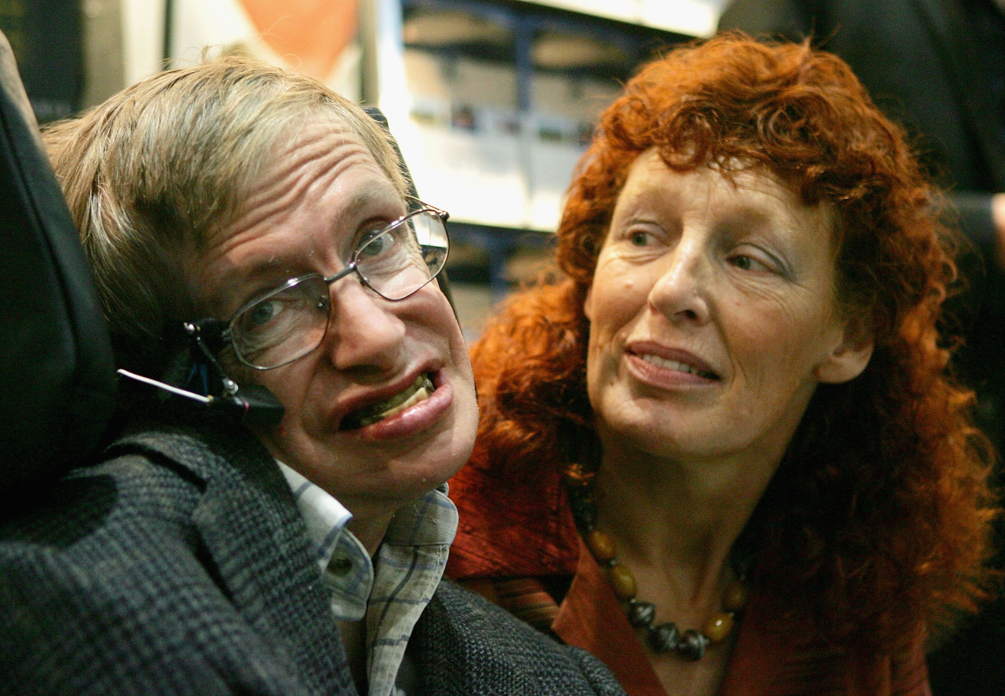 FRANKFURT, GERMANY - OCTOBER 19: Professor Stephen Hawking (L) and his wife Elaine Mason attend the international bookfair on October 19, 2005 in Frankfurt, Germany. South Korea is the guest of honour at the 57th annual Frankfurt Book Fair where 270.000 people are expected to visit the world's most important book fair, and 7000 exhibitors from 100 countries are present. (Photo by Ralph Orlowski/Getty Images)