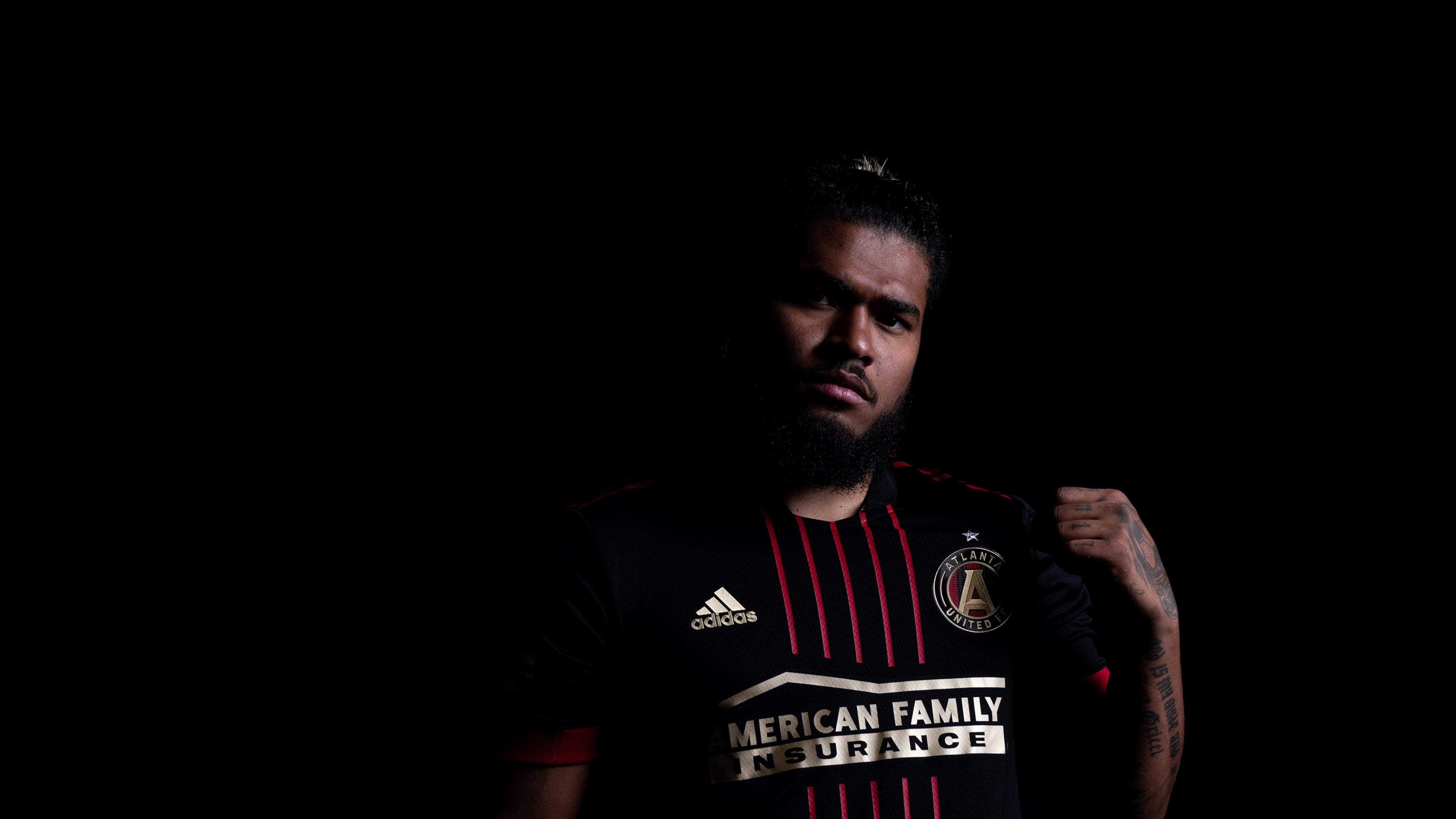 Atlanta United forward Josef Martinez poses in the new 2021 primary kit at Children's Healthcare of Atlanta Training Ground in Marietta on Tuesday January 26, 2021. (Photo by Jacob Gonzalez/Atlanta United)