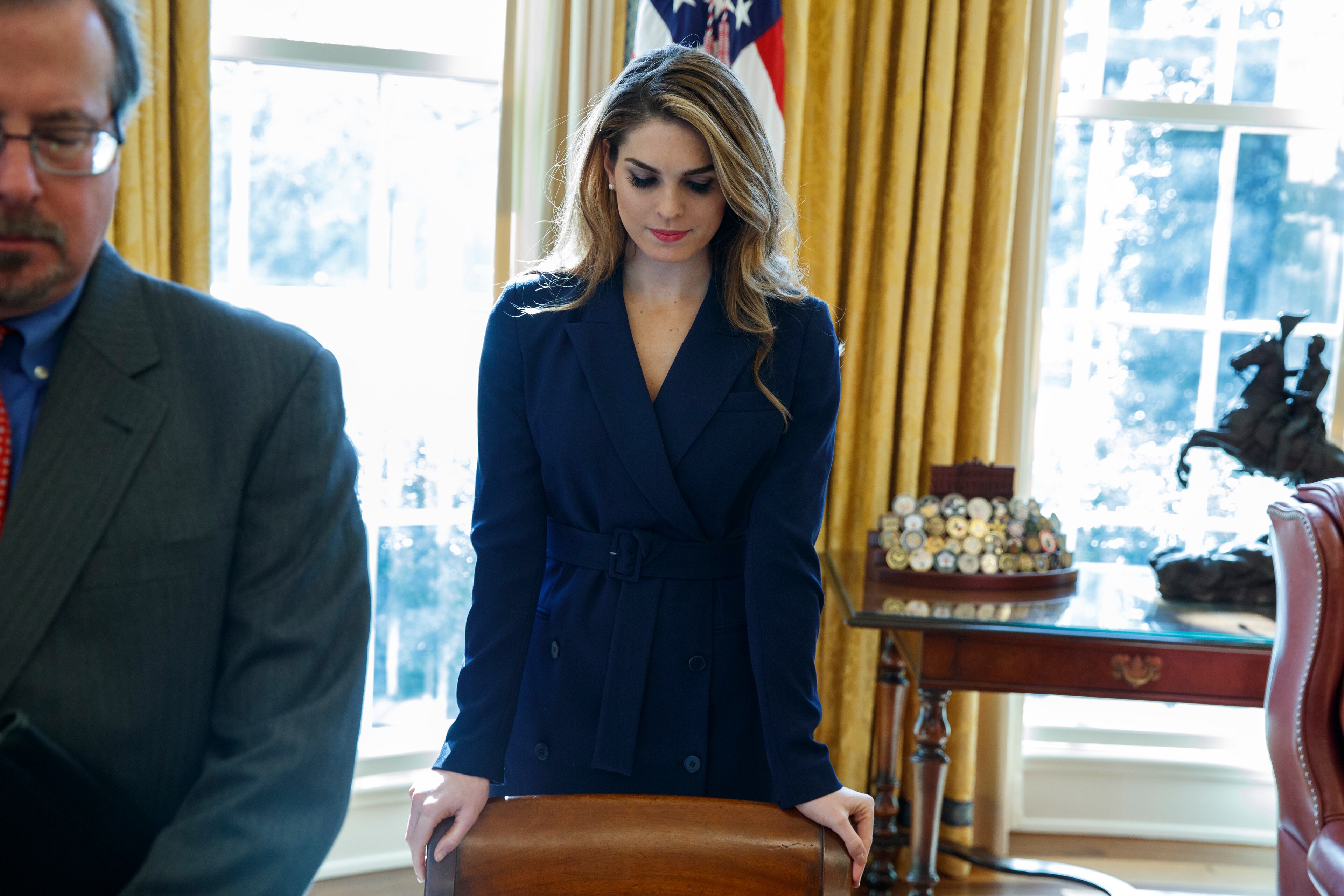 White House Communications Director Hope Hicks listens during a meeting between President Donald Trump and North Korean defectors in the Oval Office of the White House, Friday, Feb. 2, 2018, in Washington. (AP Photo/Evan Vucci)