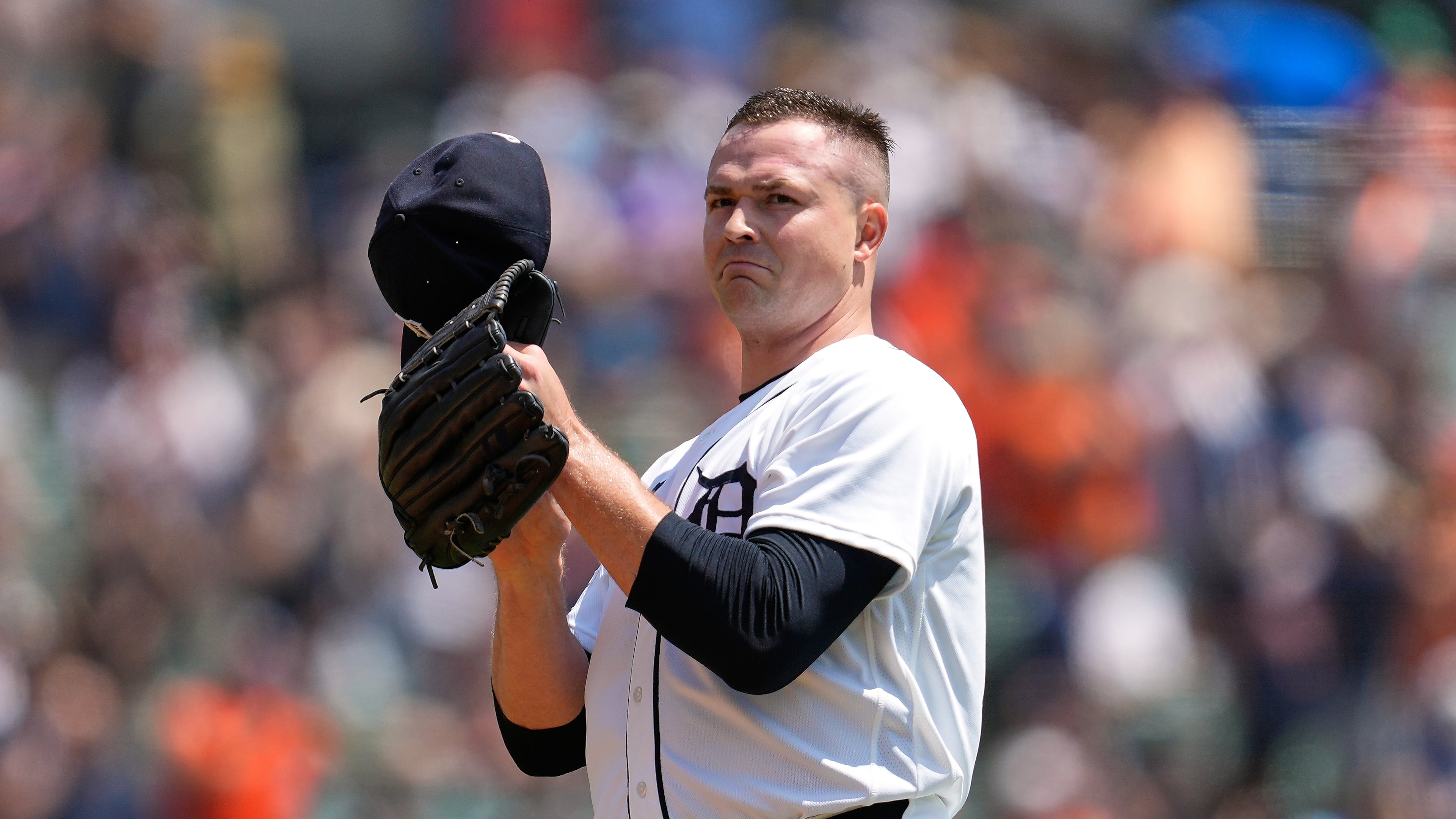Detroit Tigers pitcher Tarik Skubal tips his hat after his 1,000th career strikeout during the first inning of a baseball game against the Baltimore Orioles Wednesday, July 29, 2026, in Detroit. (AP Photo/Paul Sancya)
