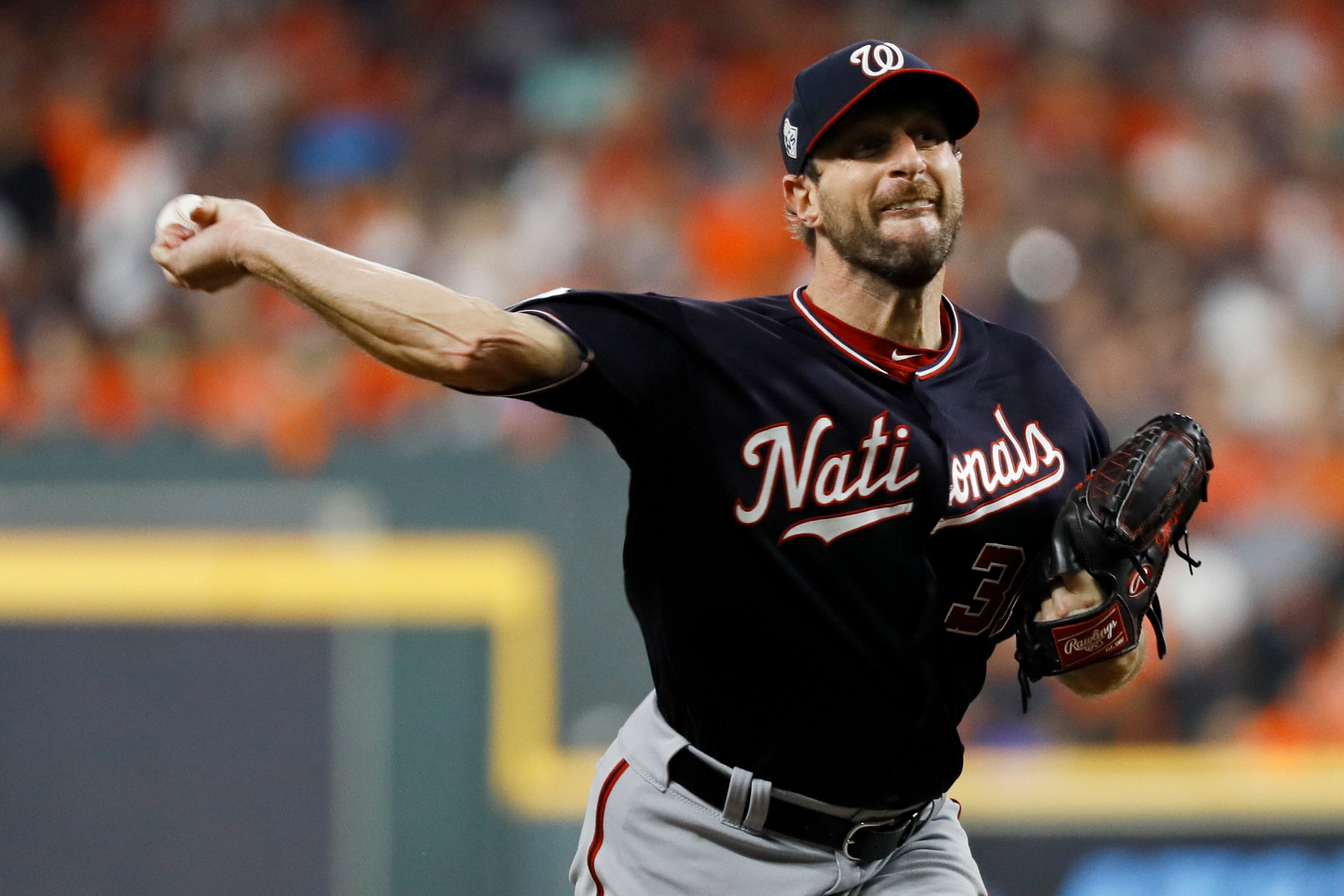 Washington Nationals starting pitcher Max Scherzer throws against the Houston Astros during the first inning of Game 1 of the baseball World Series Tuesday, Oct. 22, 2019, in Houston. (AP Photo/Matt Slocum)
