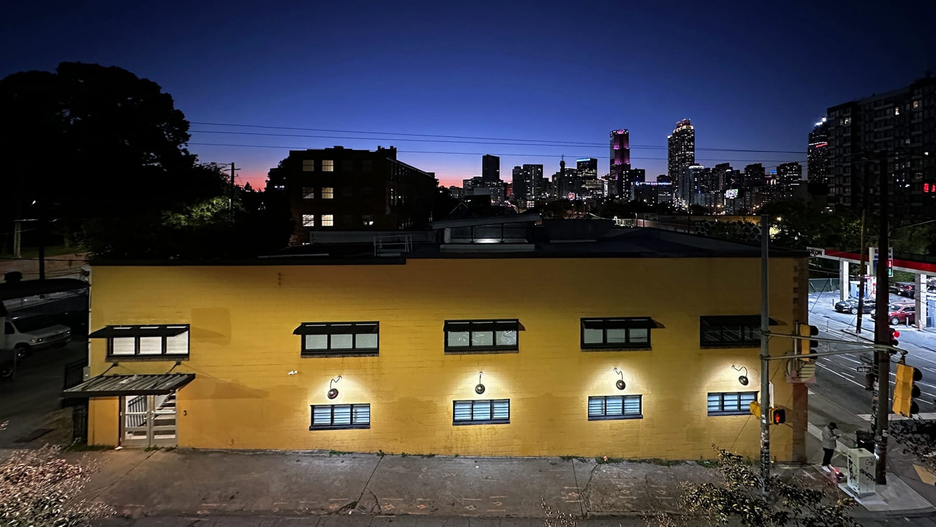 The Sun ATL, a new gallery on Edgewood Avenue in the Old Fourth Ward neighborhood, boasts a premier view of the downtown Atlanta skyline.