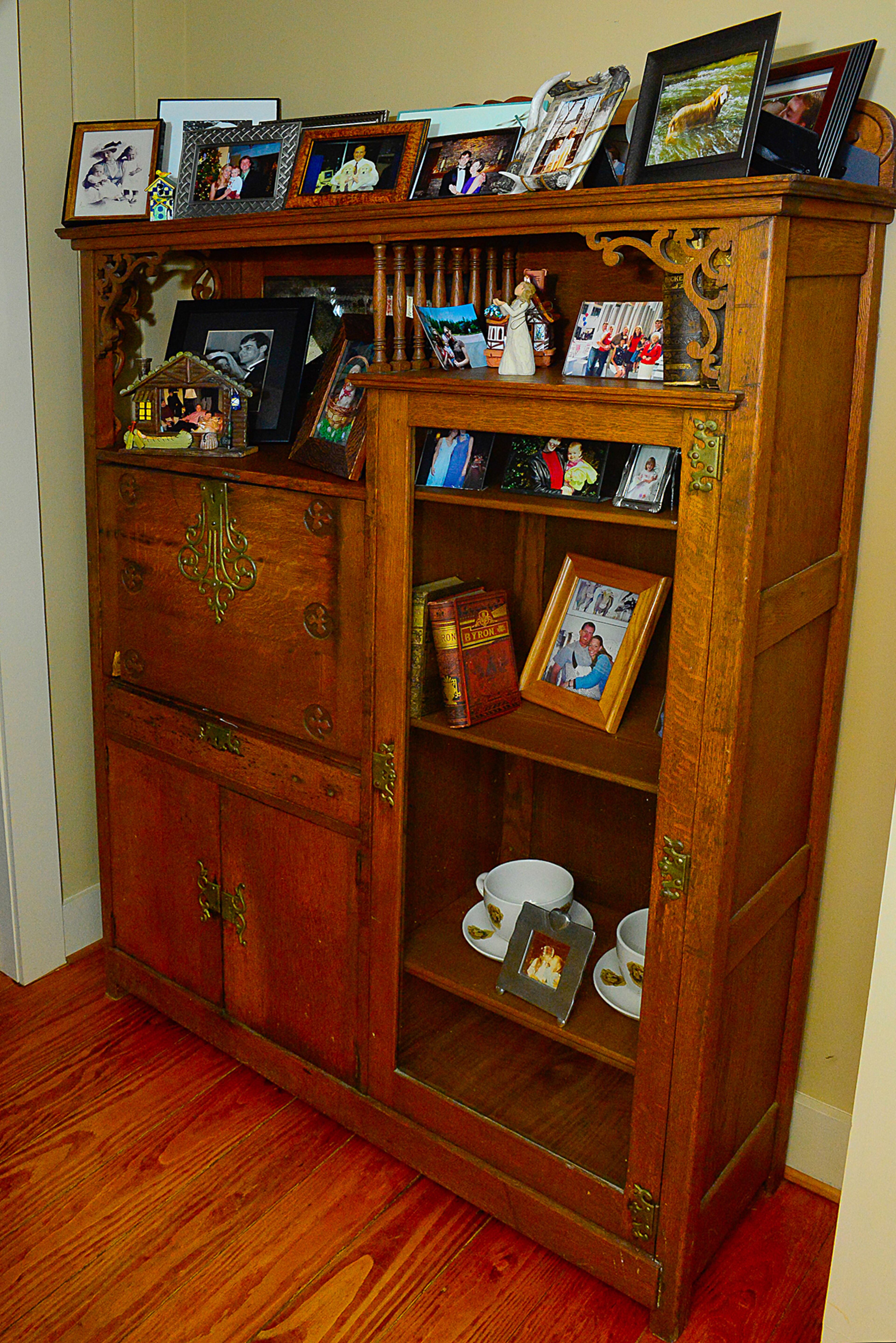 An antique cabinet that was brought from Sweden at the turn of the 20th century includes wonderful details, Andrea Pruitt said. It fills a hallway in the Pruitts' three-bedroom, three-bath home in Big Canoe.