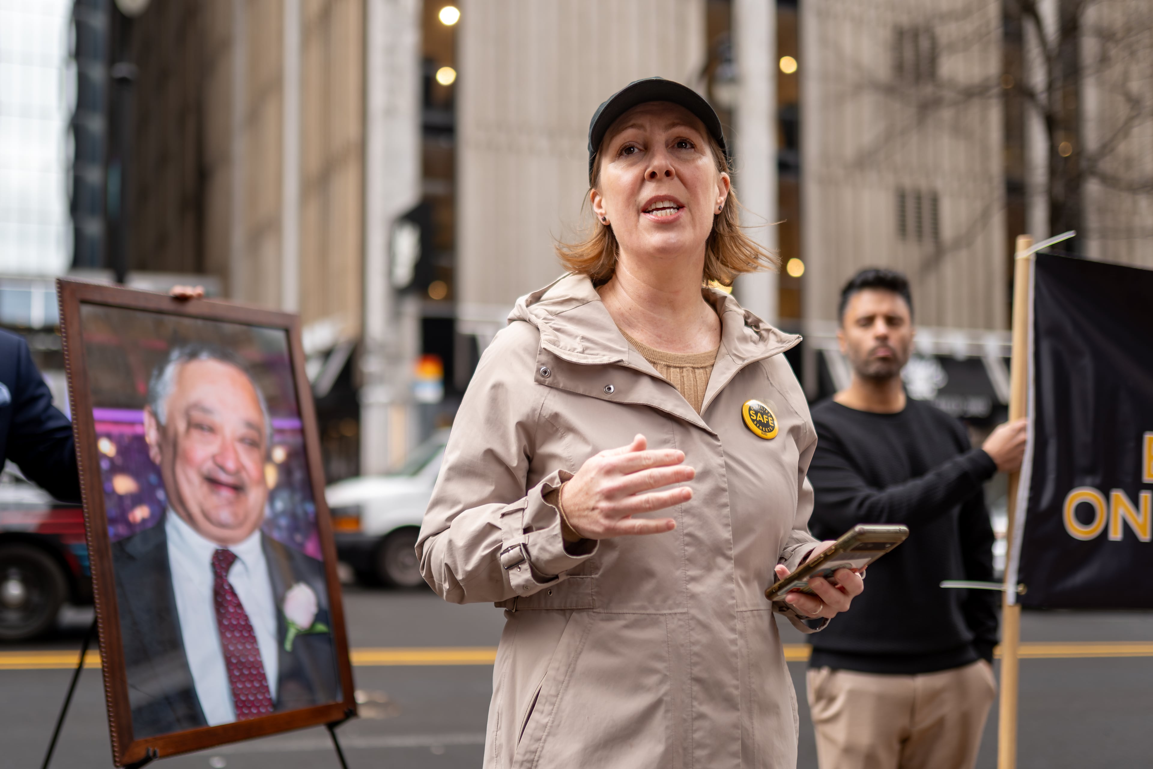 Executive Director of Propel ATL Rebecca Serna speaks at a press conference called by Propel ATL and Atlanta Families for Safe Streets on the one year anniversary of Pradeep Sood's death in a pedestrian accident. (Ben Hendren for the AJC)