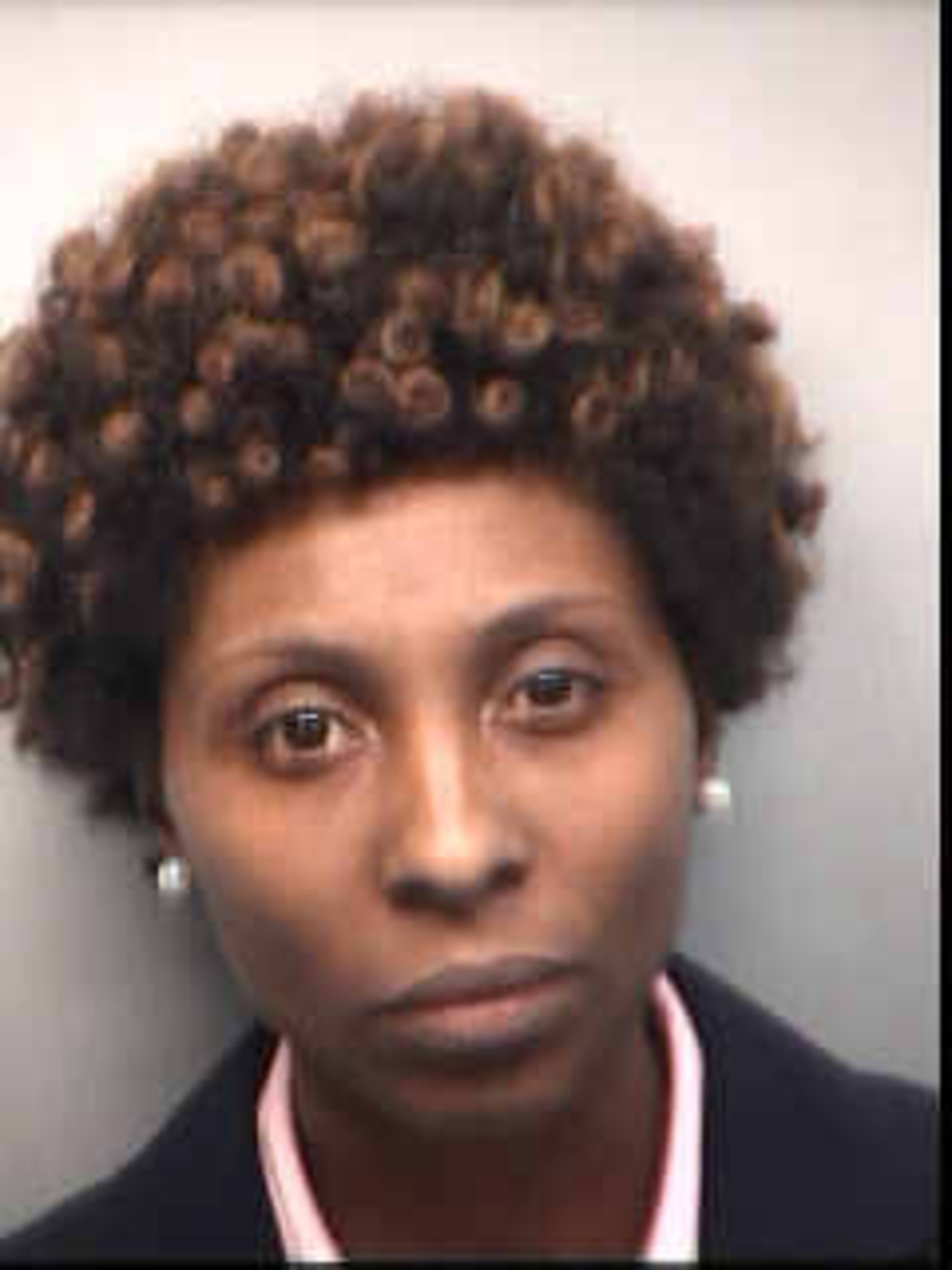 Starlette Mitchell, 31, teacher, Parks Middle, was booked into the Fulton County Jail on $50,000 bond, according to jail records. Mitchell is charged with racketeering, false statements and writings.