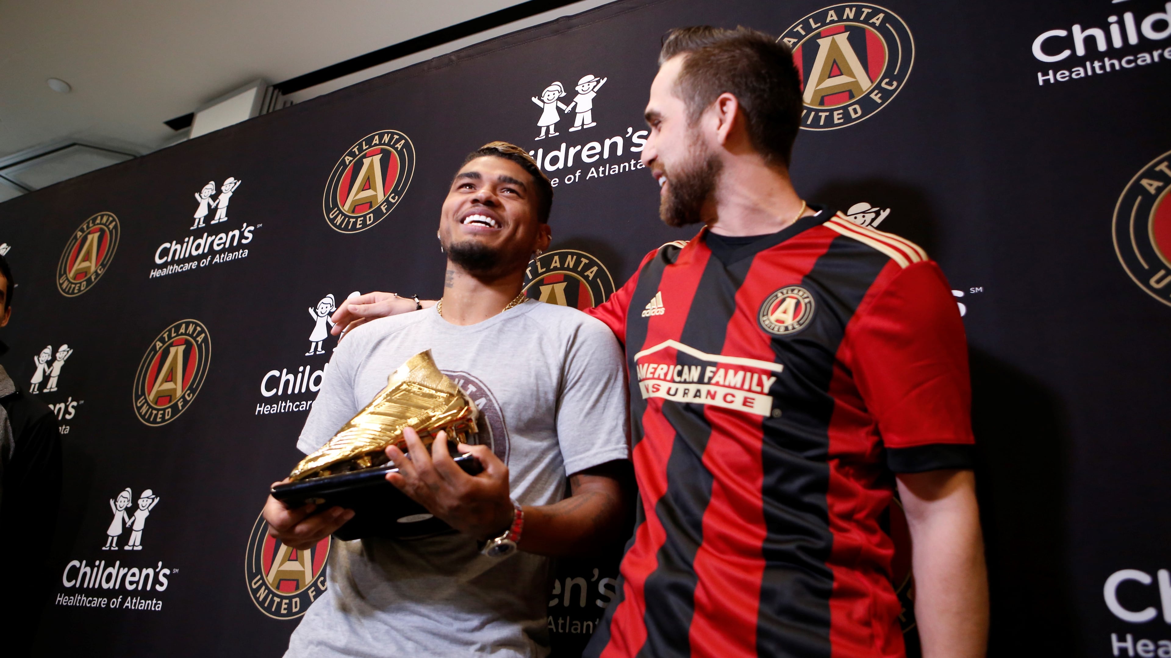 Photos from the press conference as Atlanta United forward Josef Martinez receives his Golden Boot trophy, given to the top MLS scorer each year, at the Atlanta United Training Facility in Marietta, Ga., on Thursday, Nov. 1, 2018. Atlanta Braves outfielder Ender Inciarte, a personal friend of Martinez, made a special guest appearance to give his friend the award. (Casey Sykes for The Atlanta Journal-Constitution)