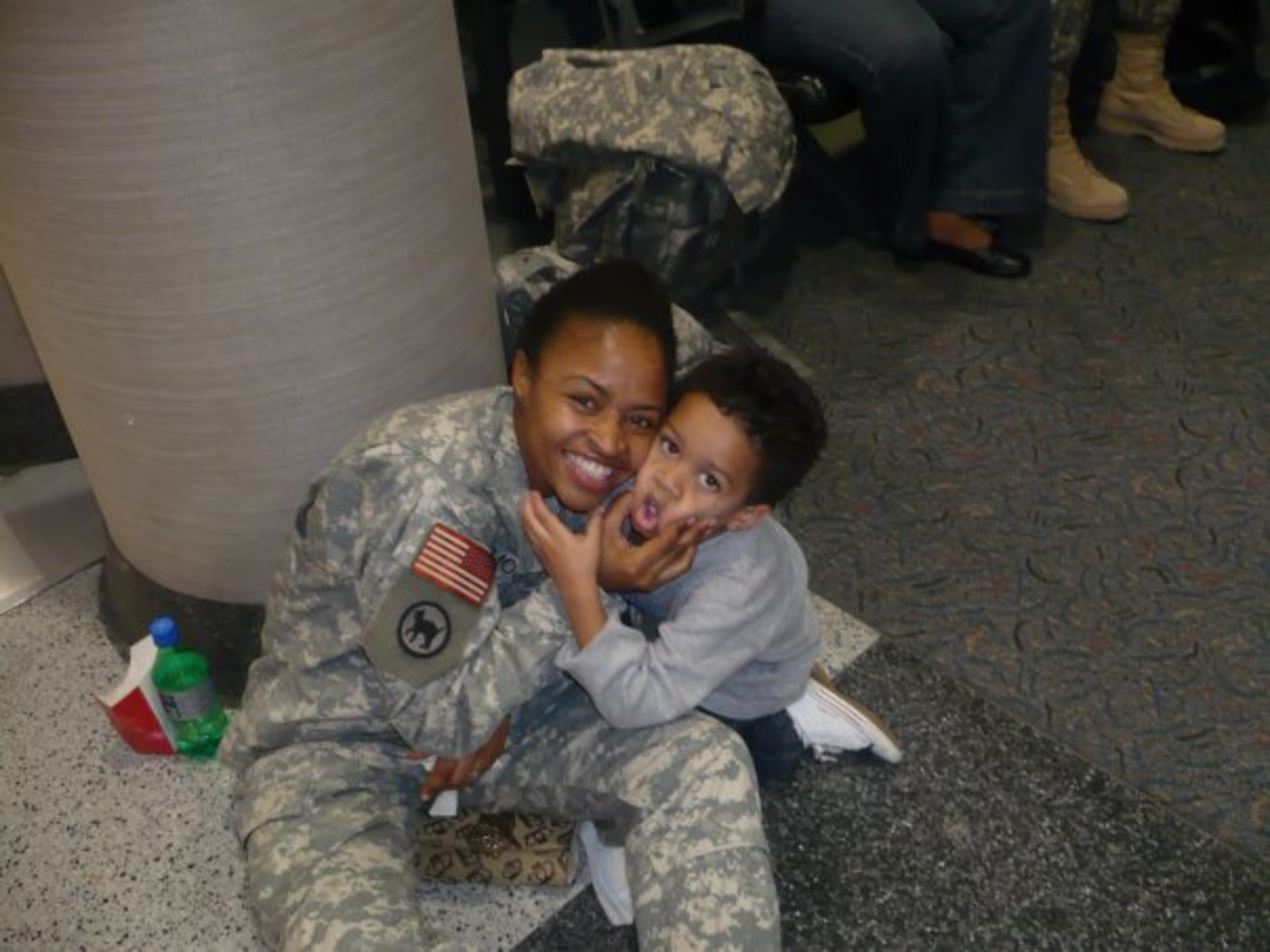 Simon shares precious last moments with her son, Michael, before her deployment to Iraq in 2007.