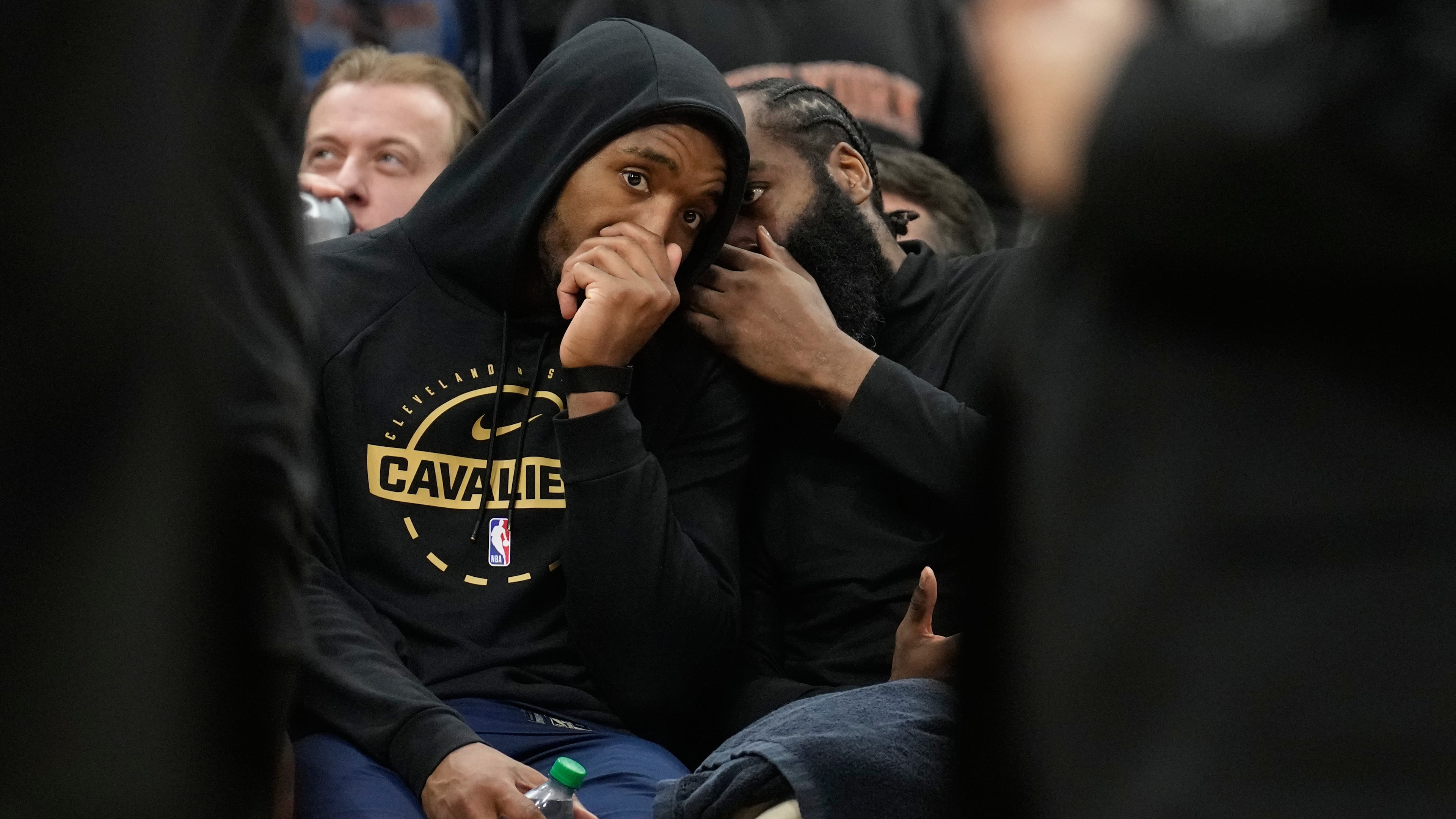 Cleveland Cavaliers guard Donovan Mitchell, left, talks with guard James Harden (1) during the second half of Game 4 in the Eastern Conference finals NBA basketball playoffs series against the New York Knicks in Cleveland, Monday, May 25, 2026. (AP Photo/Sue Ogrocki)