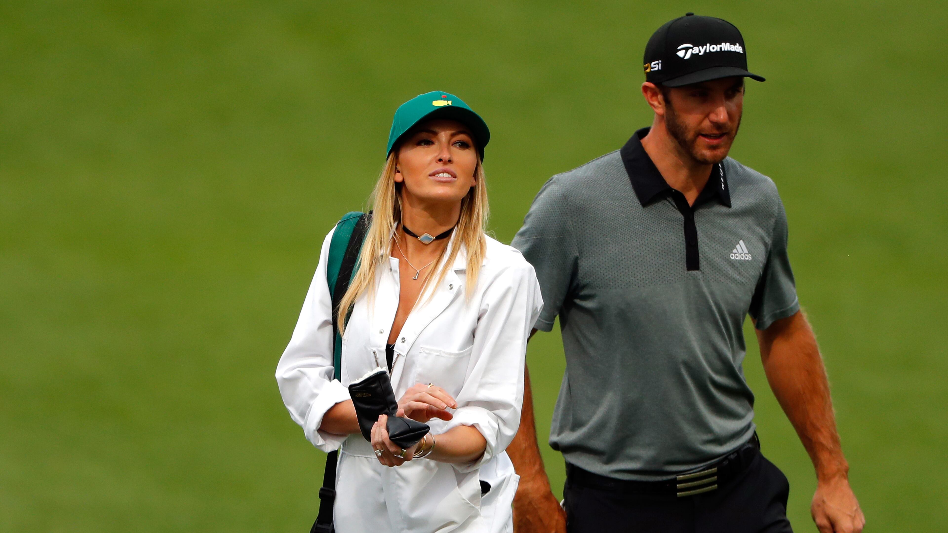 AUGUSTA, GEORGIA - APRIL 06: Dustin Johnson of the United States and Paulina Gretzky attend the Par 3 Contest prior to the start of the 2016 Masters Tournament at Augusta National Golf Club on April 6, 2016 in Augusta, Georgia. (Photo by Kevin C. Cox/Getty Images)