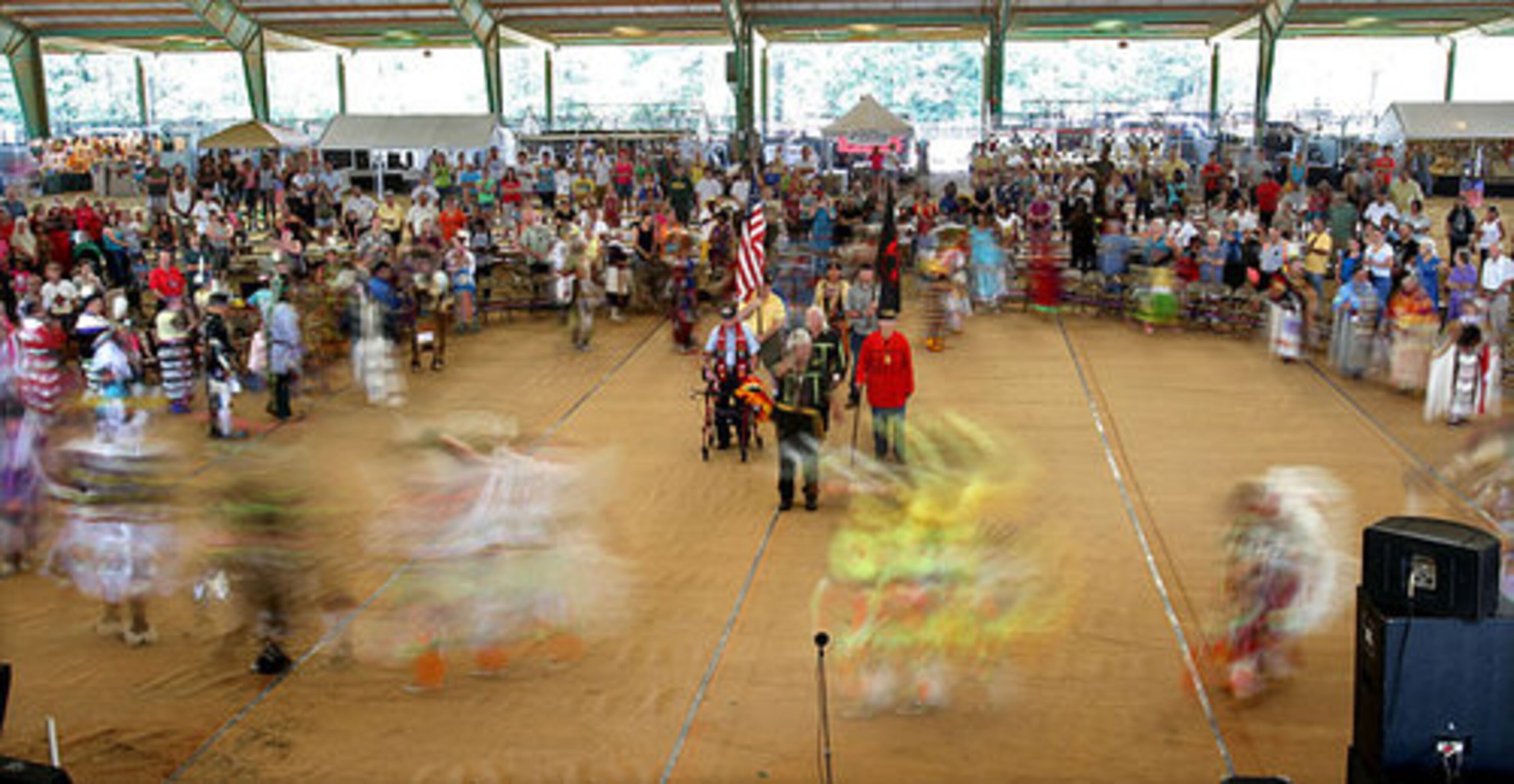 American Indian dancers perform during the grand entry of the American Indian Festival.