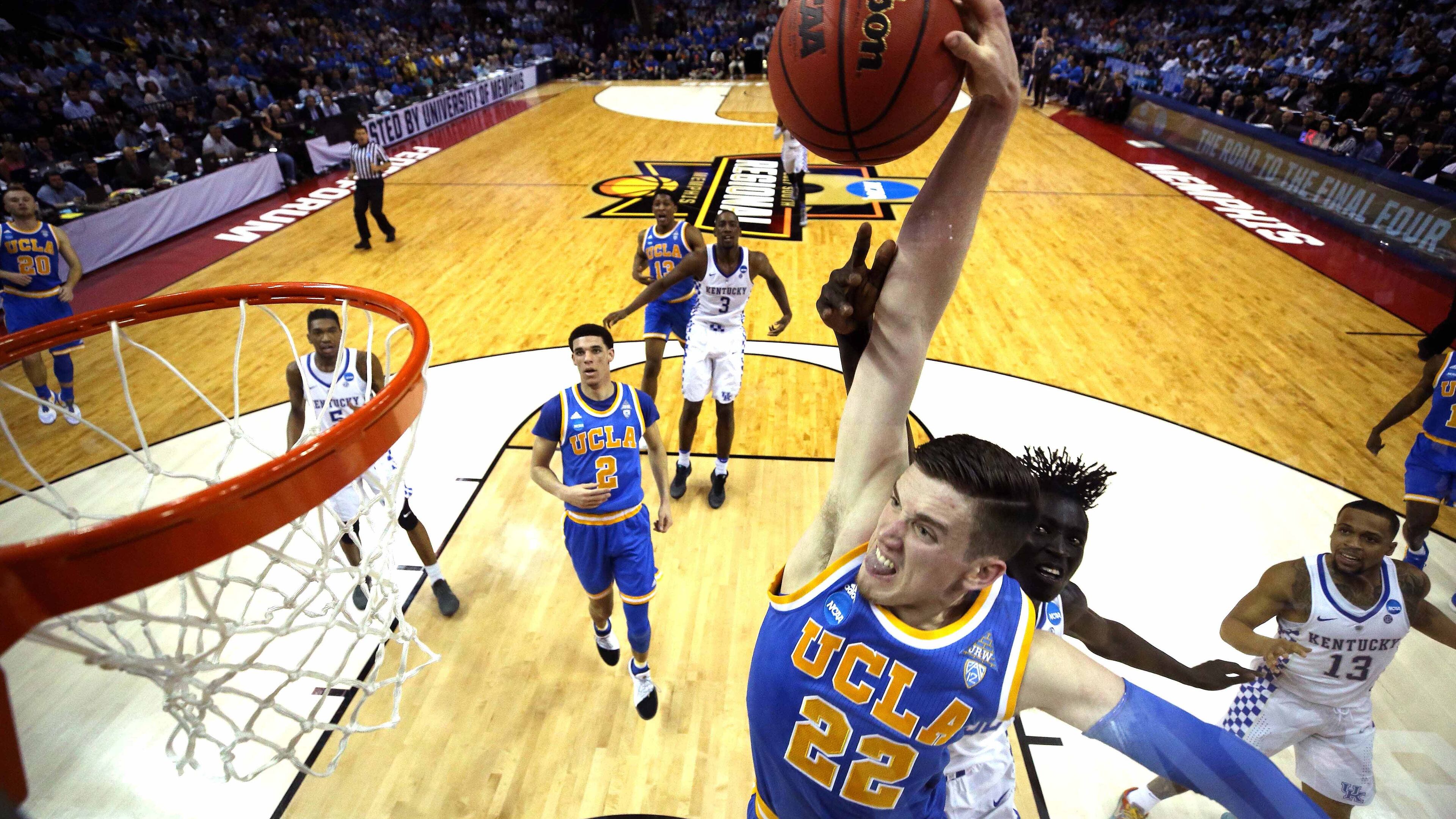 TJ Leaf of the UCLA Bruins goes up for a dunk against Wenyen Gabriel of the Kentucky Wildcats in the first half during the 2017 NCAA Men’s Basketball Tournament South Regional at FedExForum on March 24, 2017 in Memphis, Tennessee. (Photo by Andy Lyons/Getty Images)