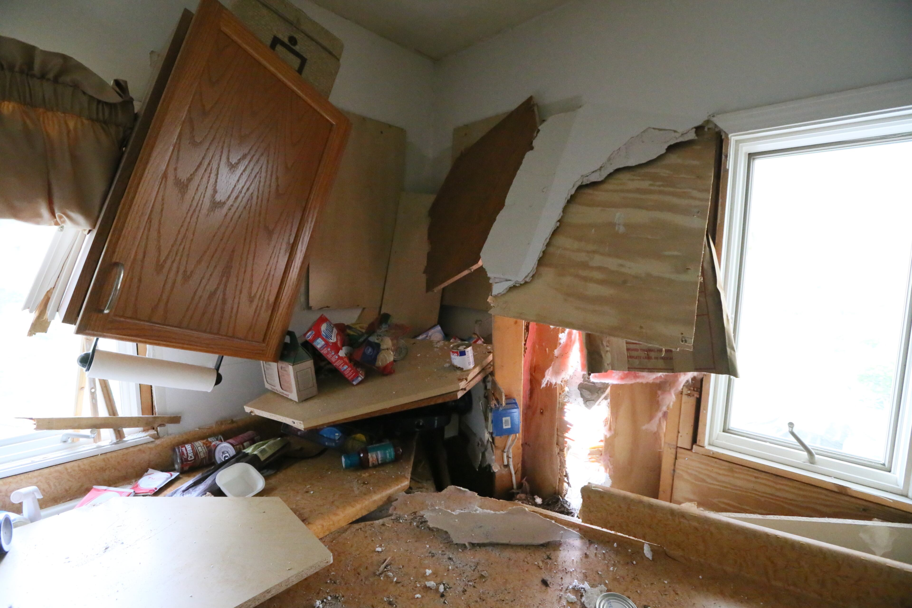 A car theft suspect fleeing police became a one-man wrecking crew early Tuesday, hitting a house as well as several cars parked along a northwest Atlanta street. JOHN SPINK@JSPINK@AJC.COM