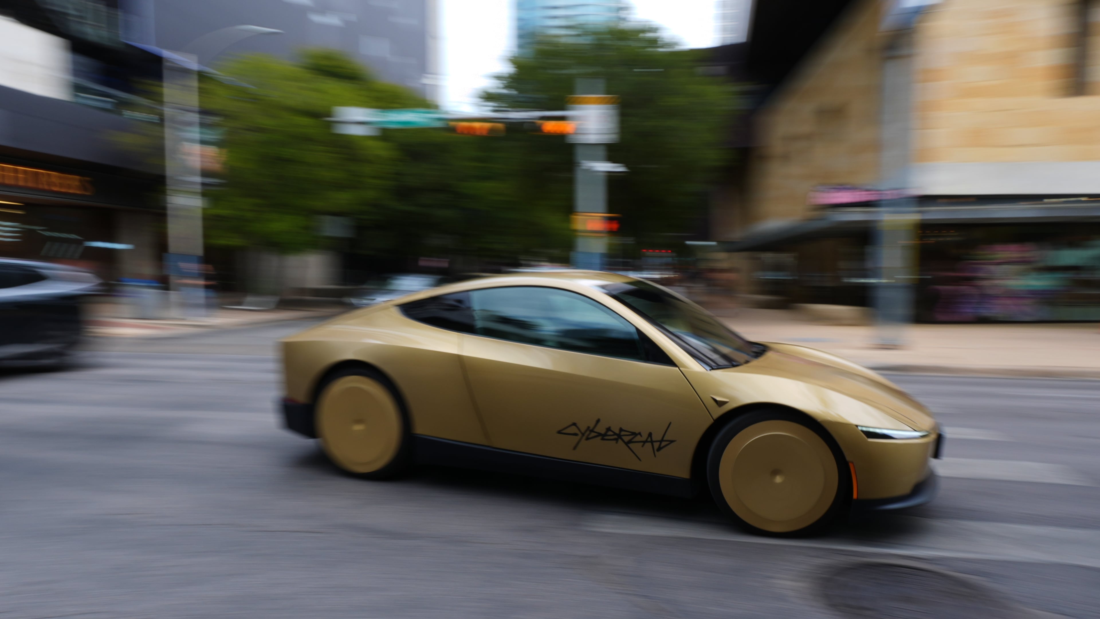 A Tesla Cybercab moves through downtown Austin, Texas, Thursday, Sept. 3, 2026. (AP Photo/Eric Gay)