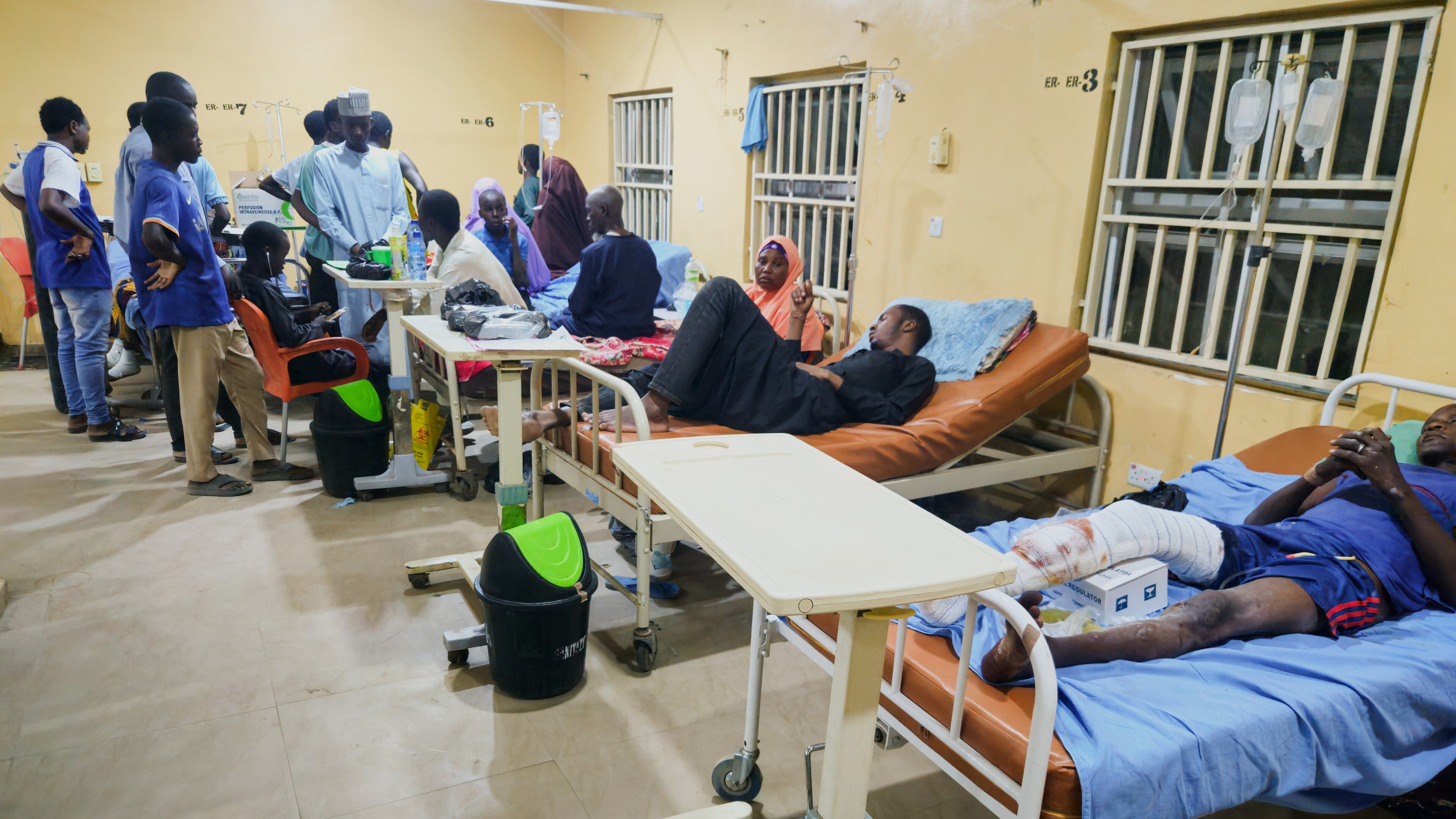 Patients receive treatment at a hospital in Damaturu after Nigerian Air Force strikes targeting jihadi rebels hit a local market Saturday in northeastern Nigeria, Sunday, April 12, 2026. (AP Photo/Micheal Abu)