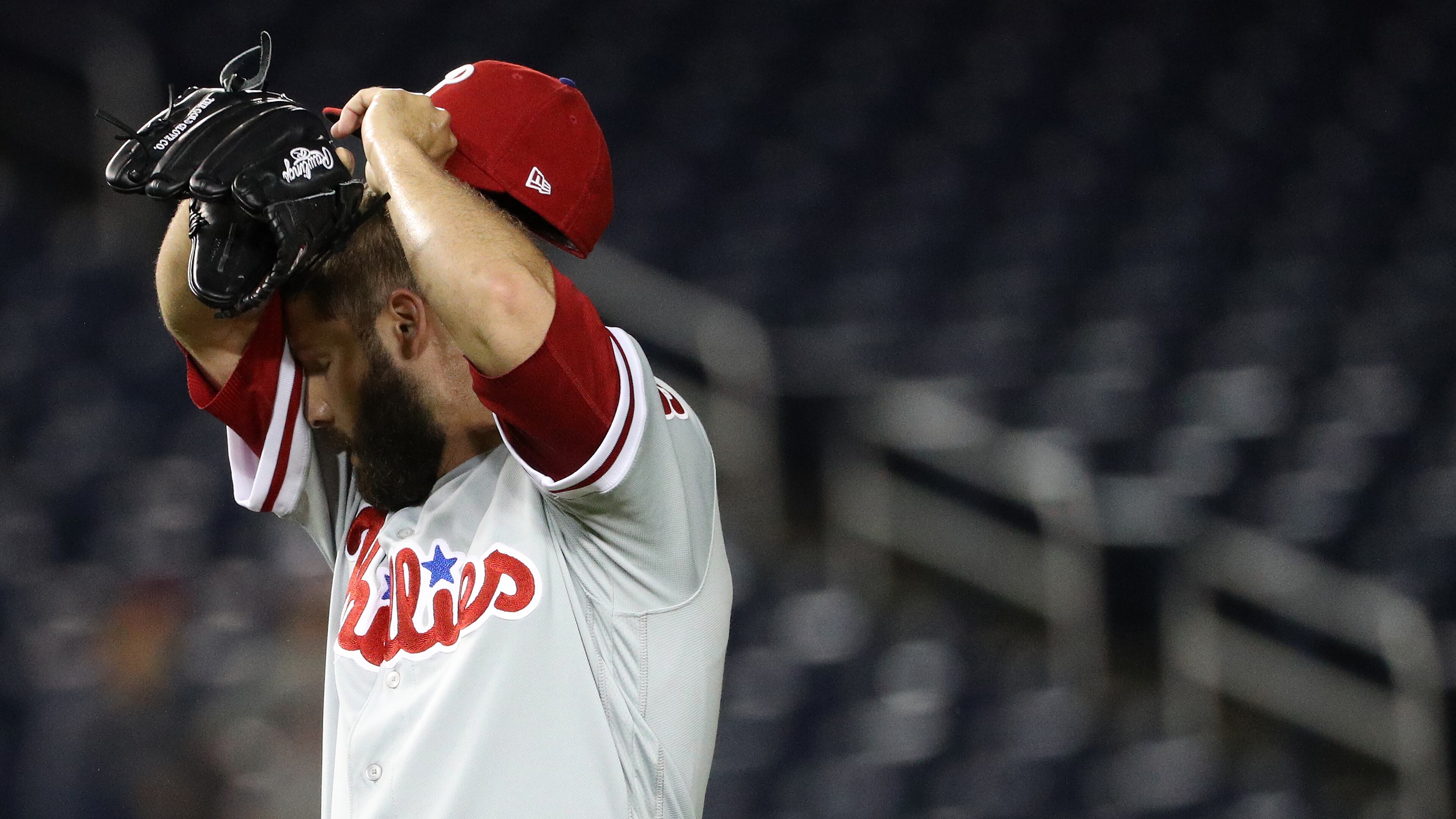 Pitcher Adam Morgan #46 of the Philadelphia Phillies reacts after allowing a home run to Wilmer Difo #1 of the Washington Nationals during the sixth inning at Nationals Park on August 21, 2018 in Washington, DC. (Photo by Patrick Smith/Getty Images)