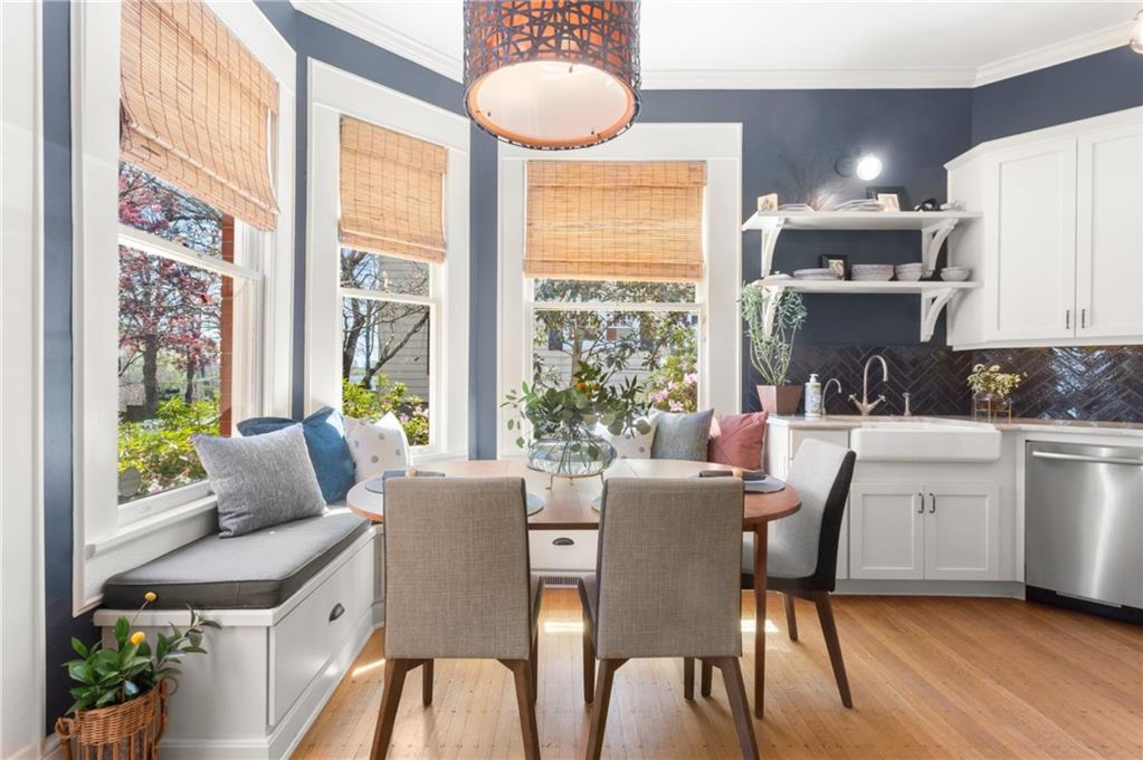 Gorgeous custom light fixtures continue into the kitchen.