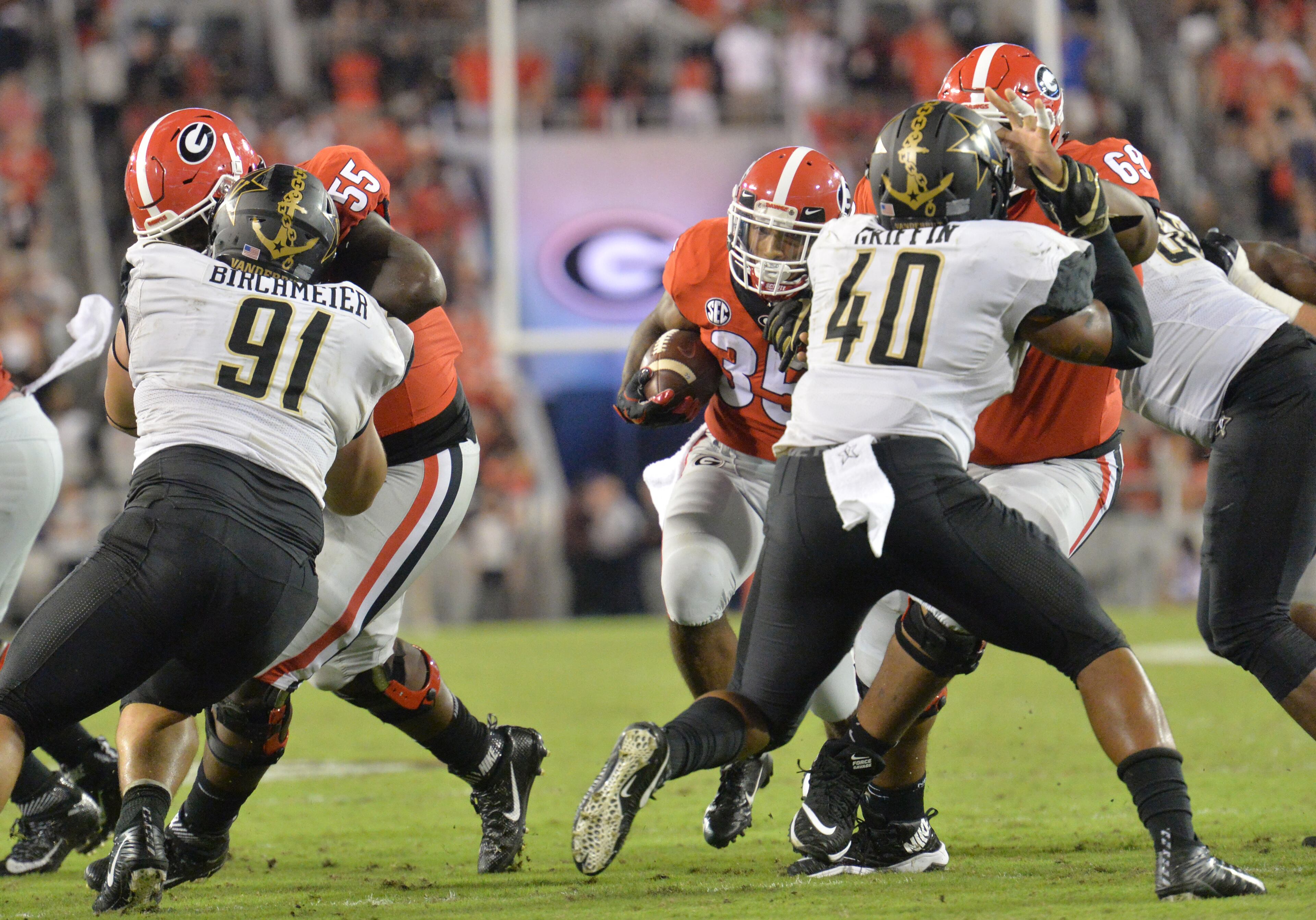 October 6, 2018 Athens - Georgia running back Brian Herrien (35) rushes for a touchdown in the second half during a NCAA college football game at Sanford Stadium in Athens on Saturday, October 6, 2018. Georgia won 41-13 over the Vanderbilt. HYOSUB SHIN / HSHIN@AJC.COM