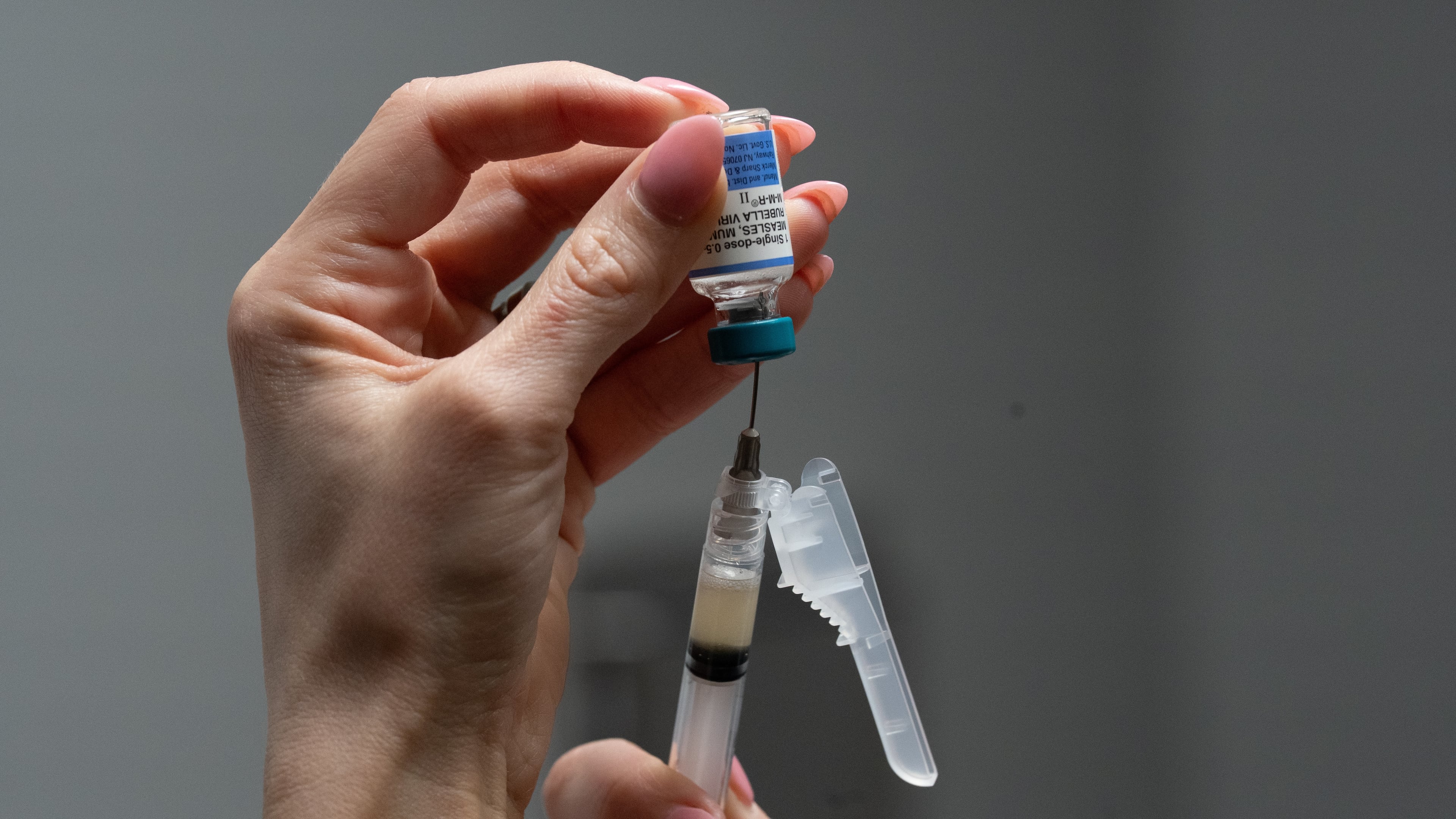 Lauren Ellenburg, a nurse, prepares a combination measles, mumps and rubella vaccine for a 12-month-old at Tiger Pediatrics in Easley, S.C., on March 17, 2026. (Mary Conlon/AP)
