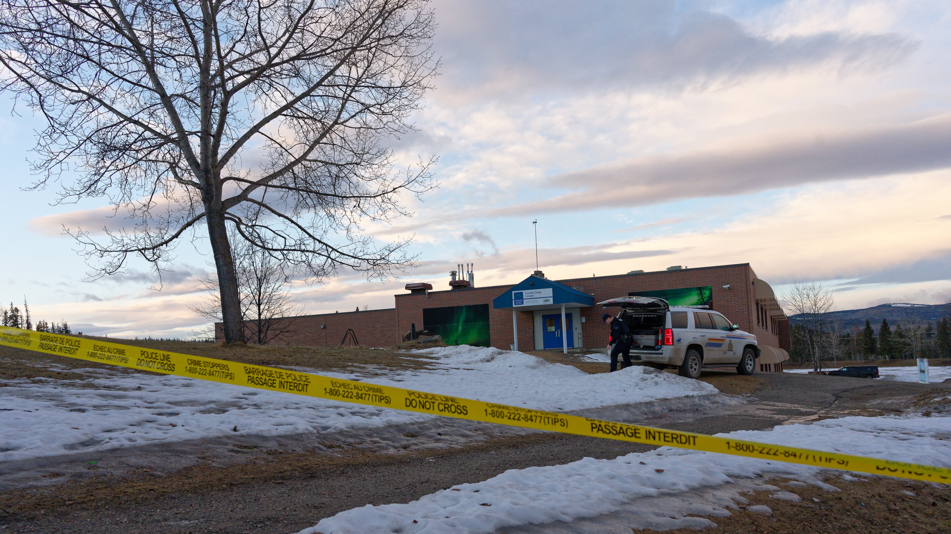 Police began putting tape out near the Tumbler Ridge Secondary School and surrounding buildings in Tumbler Ridge, B.C. on Wednesday, Feb. 11, 2026.(Jesse Boily /The Canadian Press via AP)