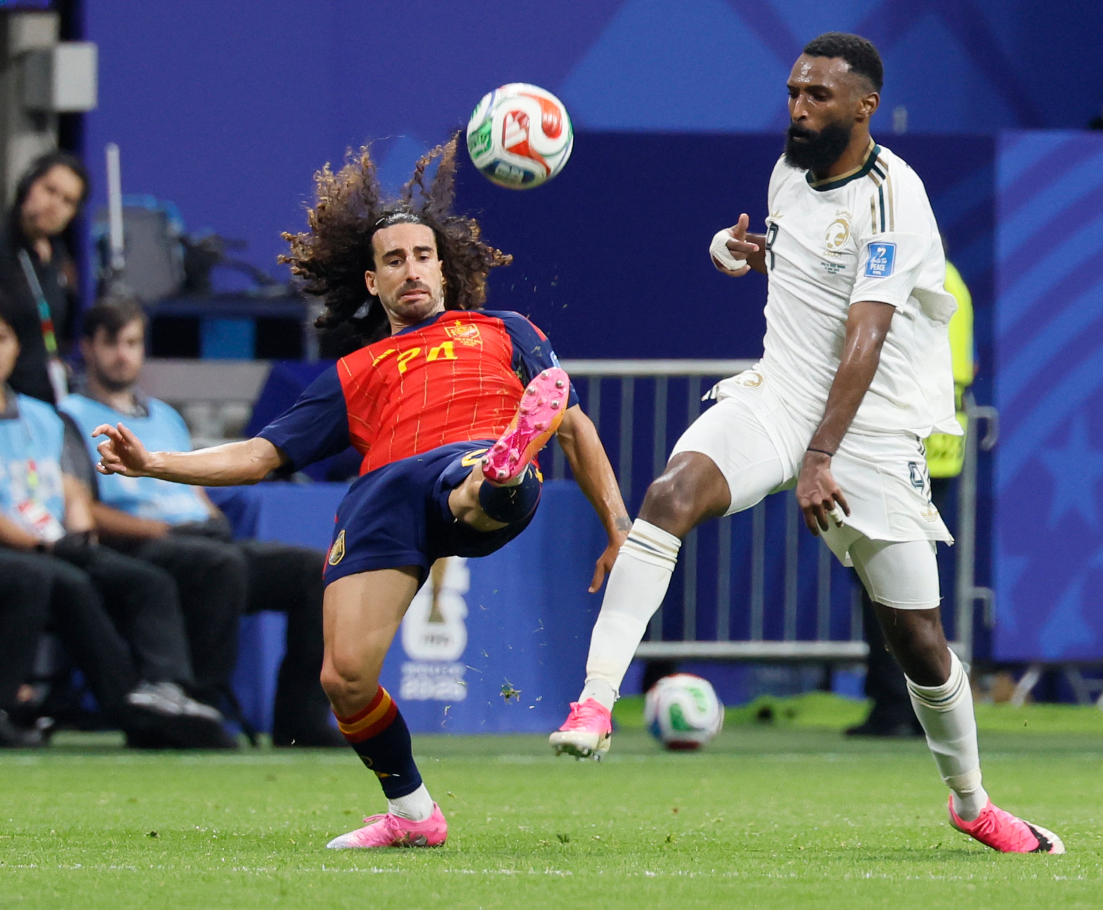 Spain's Marc Cucurella (left) battles Saudi Arabia's Feras Al-Brikan for the ball during the second half of the Spain vs. Saudi Arabia World Cup match Sunday, June 21, 2026, at Atlanta Stadium. (Miguel Martinez/AJC)