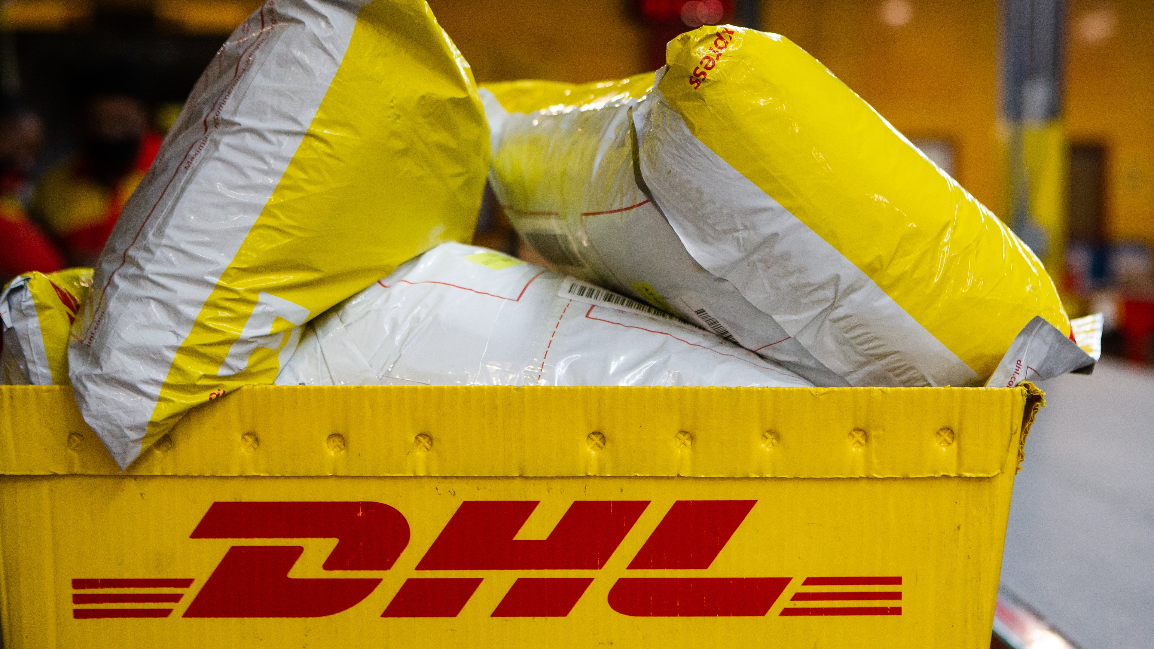 A box of DHL packages is prepared to be shipped on Wednesday, December 16, 2020, at DHL Express in Atlanta. Workers at the shipping center worked to fulfill orders during the holiday rush. CHRISTINA MATACOTTA FOR THE ATLANTA JOURNAL-CONSTITUTION.