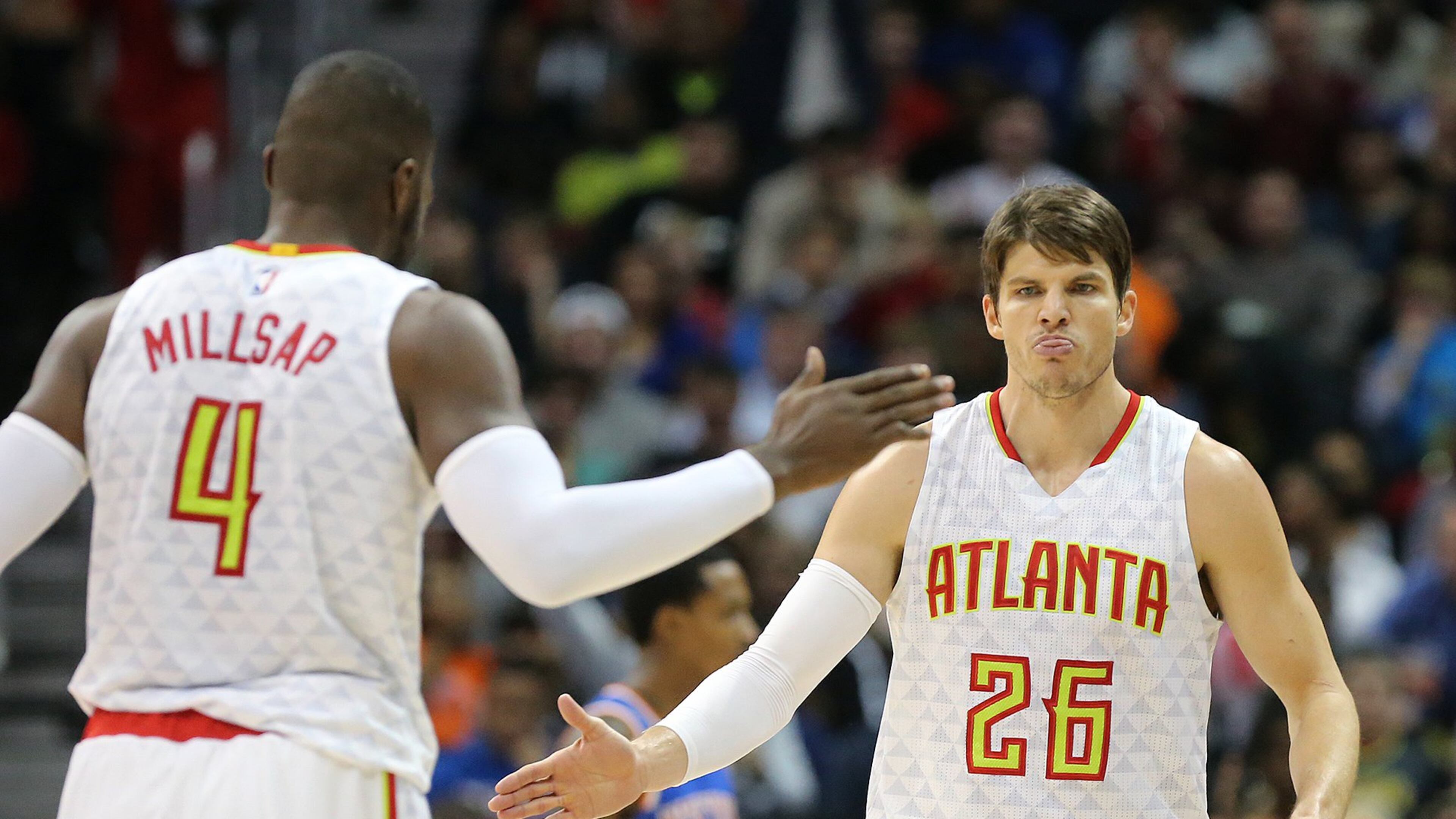 Hawks Paul Millsap gives Kyle Korver five during a 102-98 victory over the Knicks during overtime in a NBA basketball game on Wednesday, Dec. 28, 2016, in Atlanta. Curtis Compton/ccompton@ajc.com