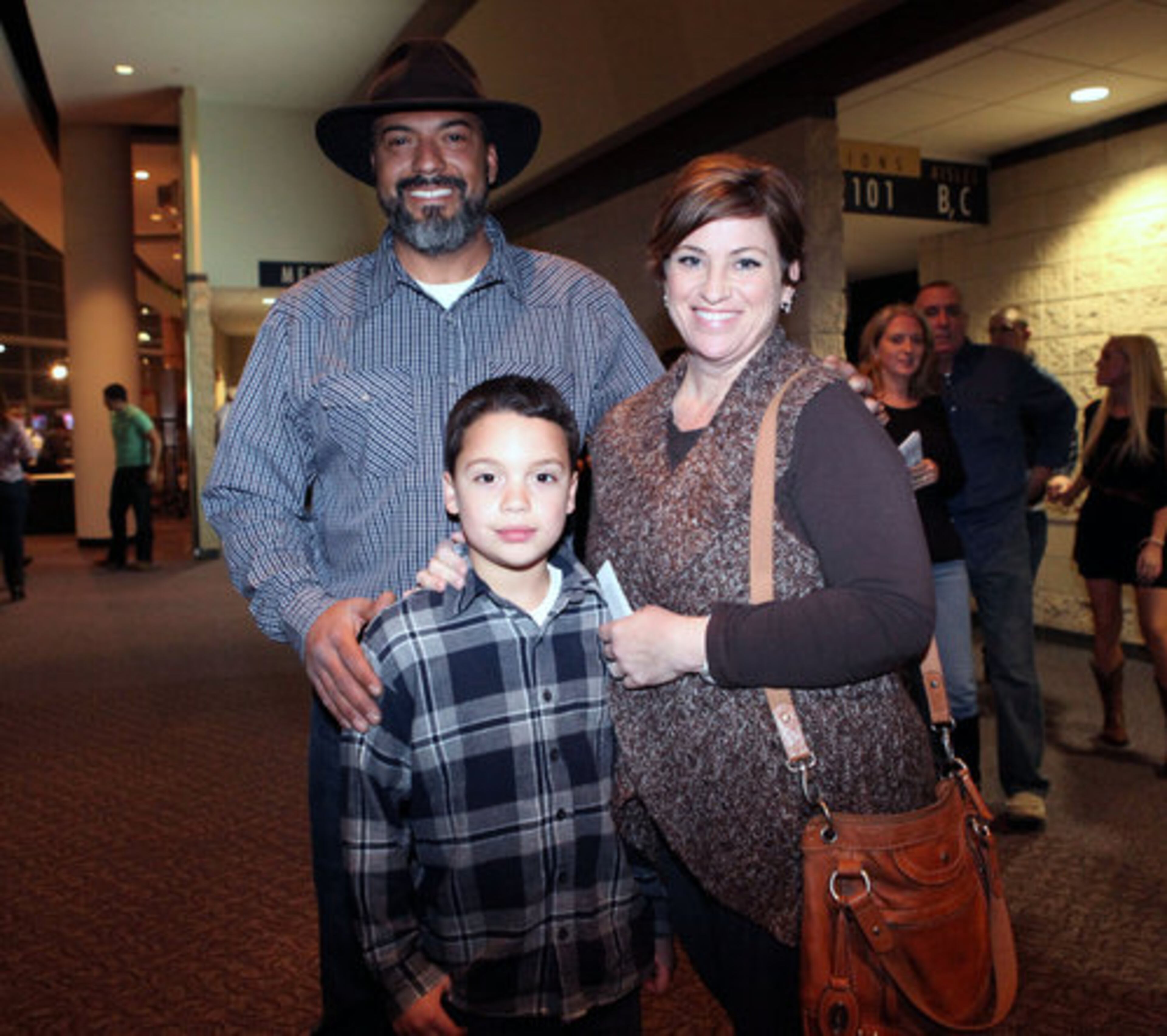 These Blake Shelton fans from Loganville are Charles, 8-year-old Cody, and Cricket Leeper.