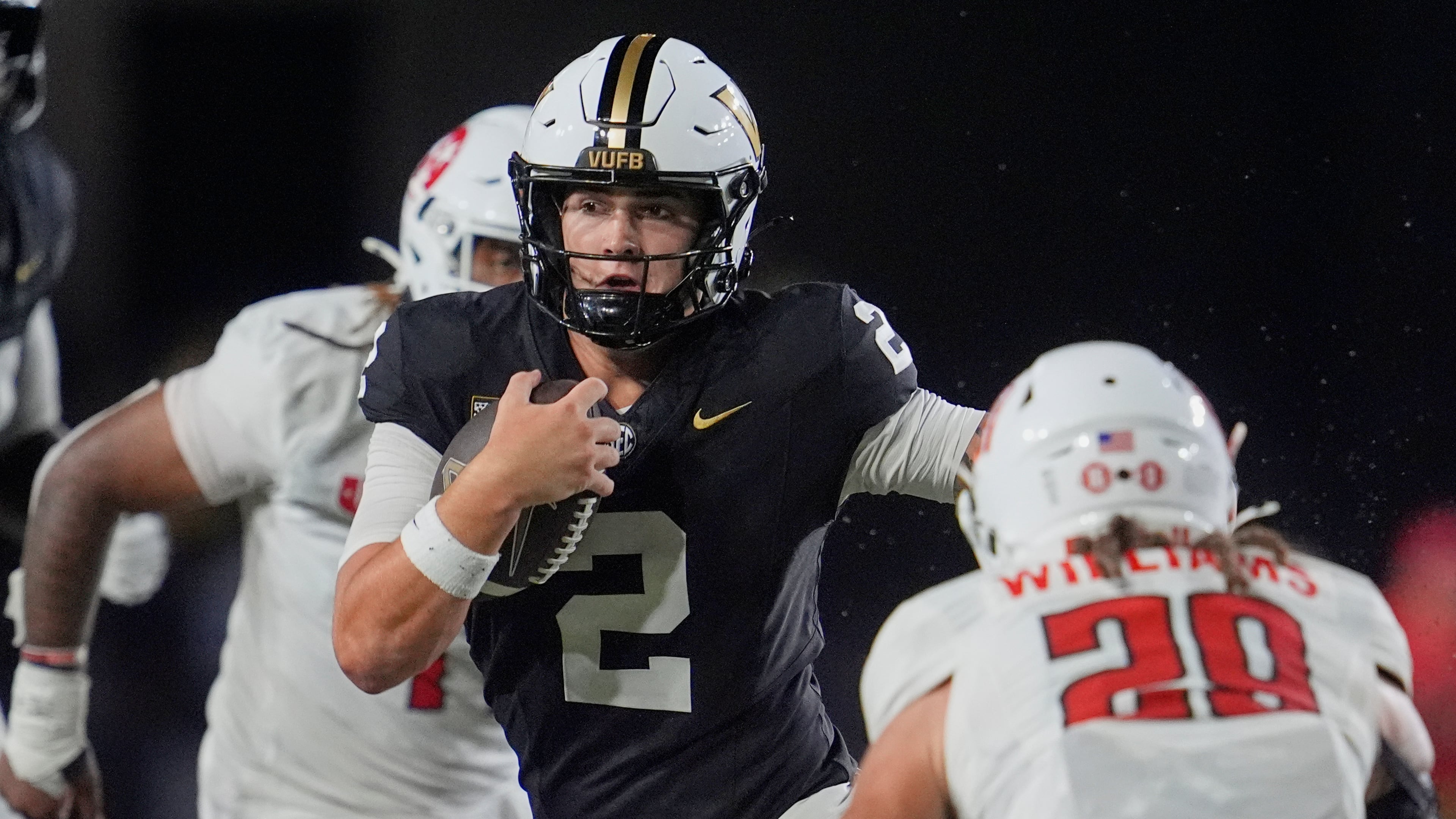 Vanderbilt quarterback Jared Curtis runs the ball during the second half of an NCAA college football game against Austin Peay, Saturday, Sept. 5, 2026, in Nashville, Tenn. (George Walker IV/AP)