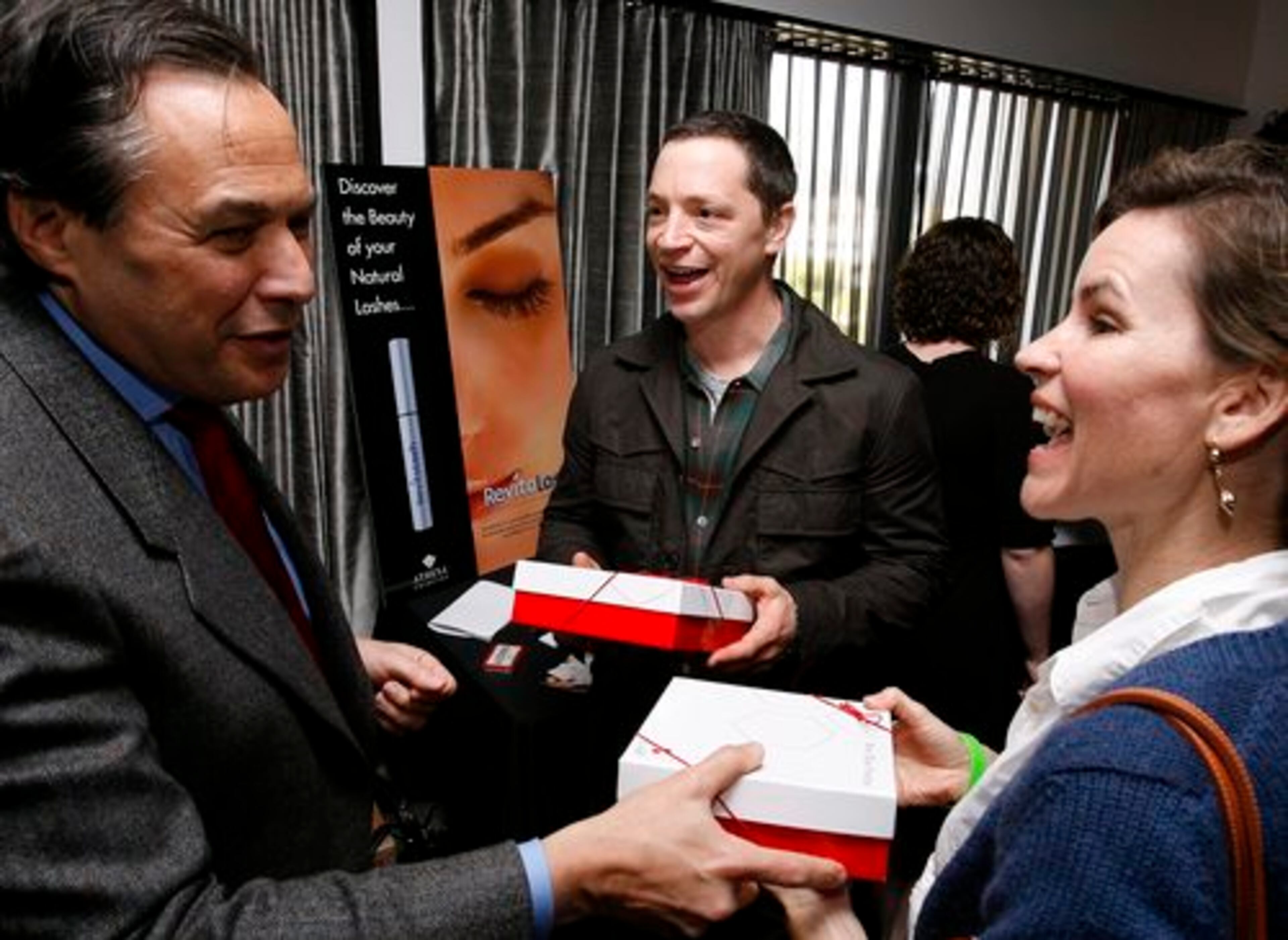 Joshua Malina (center, "Big Shots" and "The West Wing") and his wife, Melissa, right) talk with Specer Kanis (left) of 3Lab, a skincare company.