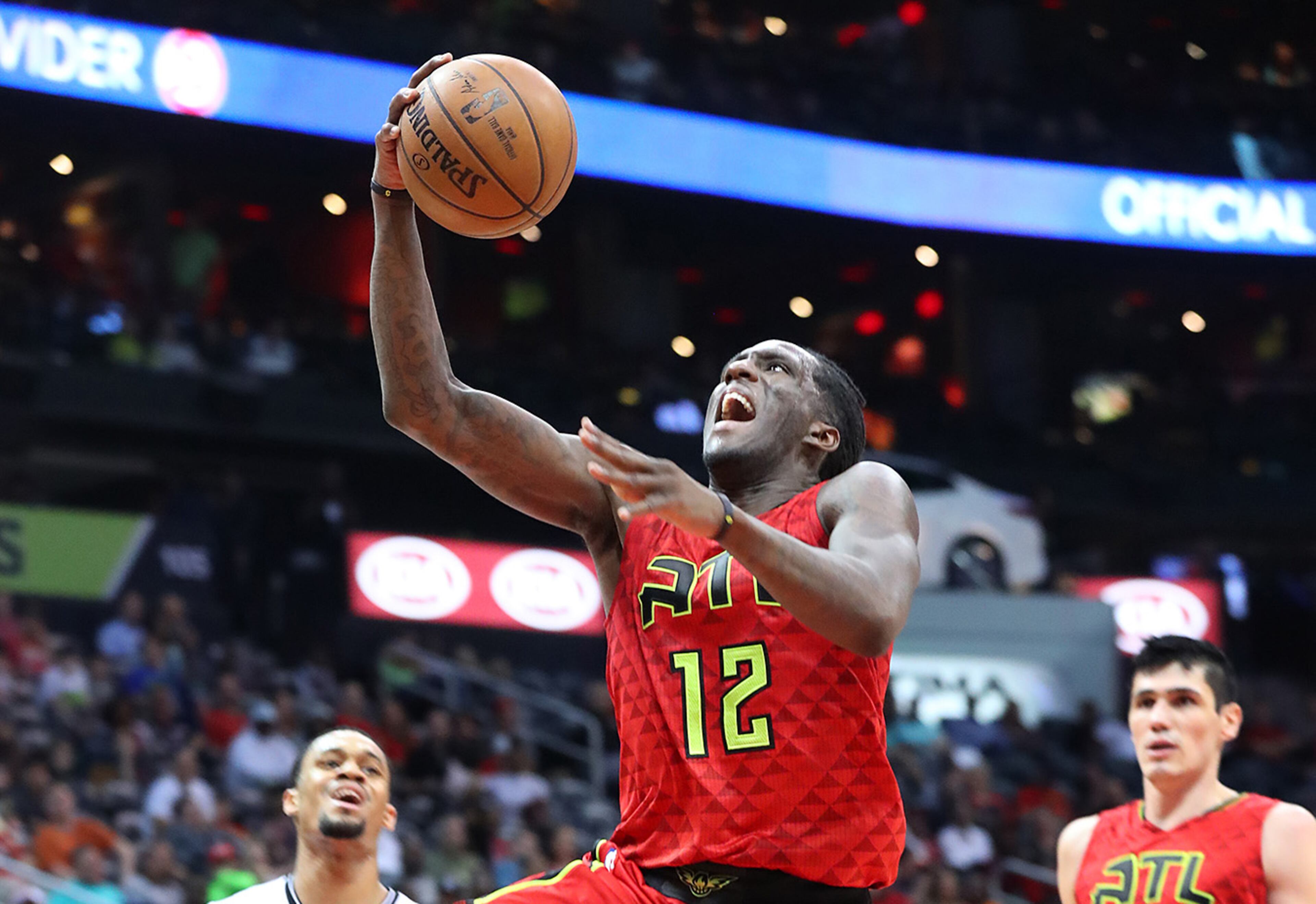 March 26, 2017, Atlanta: Atlanta Hawks Taurean Prince, getting his first start, drives to the basket for two past Brooklyn Nets forward K.J. McDaniels in a NBA basketball game on Sunday, March 26, 2017, in Atlanta. Curtis Compton/ccompton@ajc.com