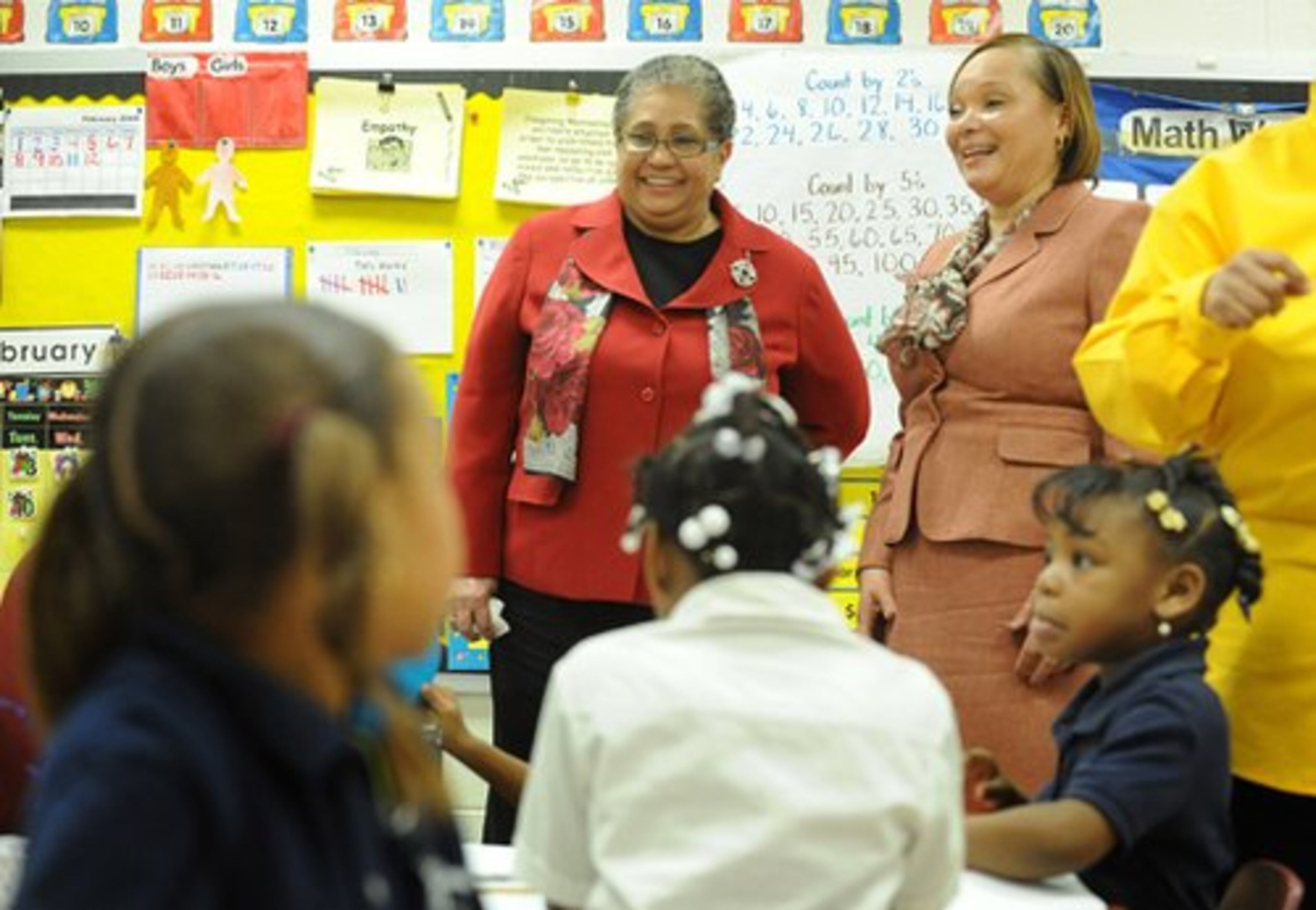 Atlanta schools superintendent Beverly Hall (left) and Principal Robin Hall (right) talk to students at Beecher Hills.