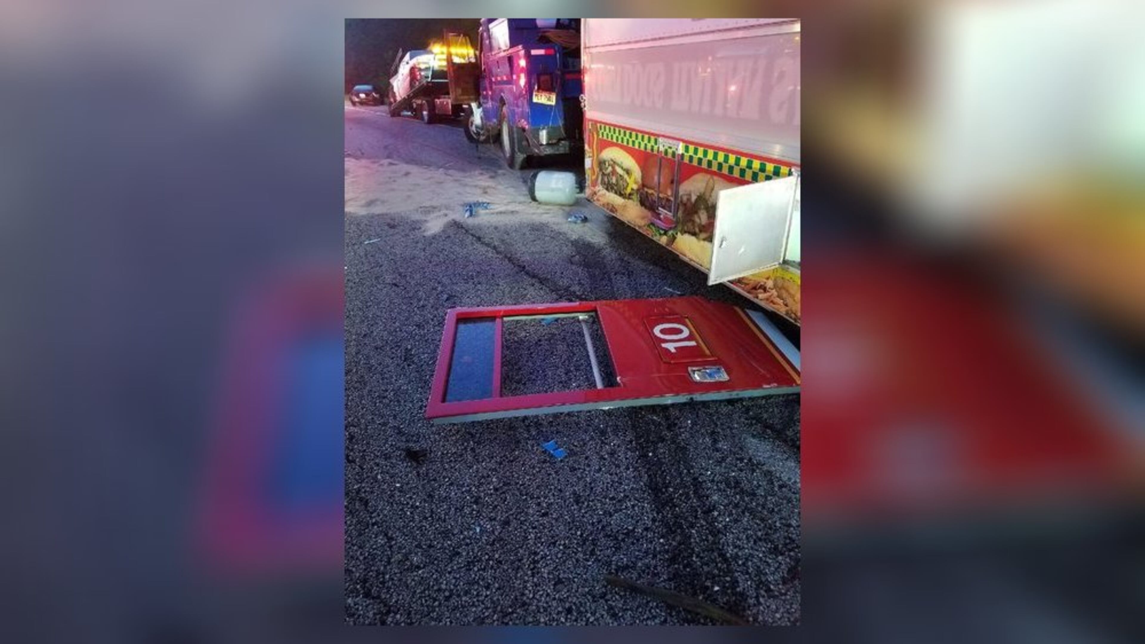 A DeKalb County firetruck was damaged by a tractor-trailer on I-285. (Credit: Channel 2 Action News)