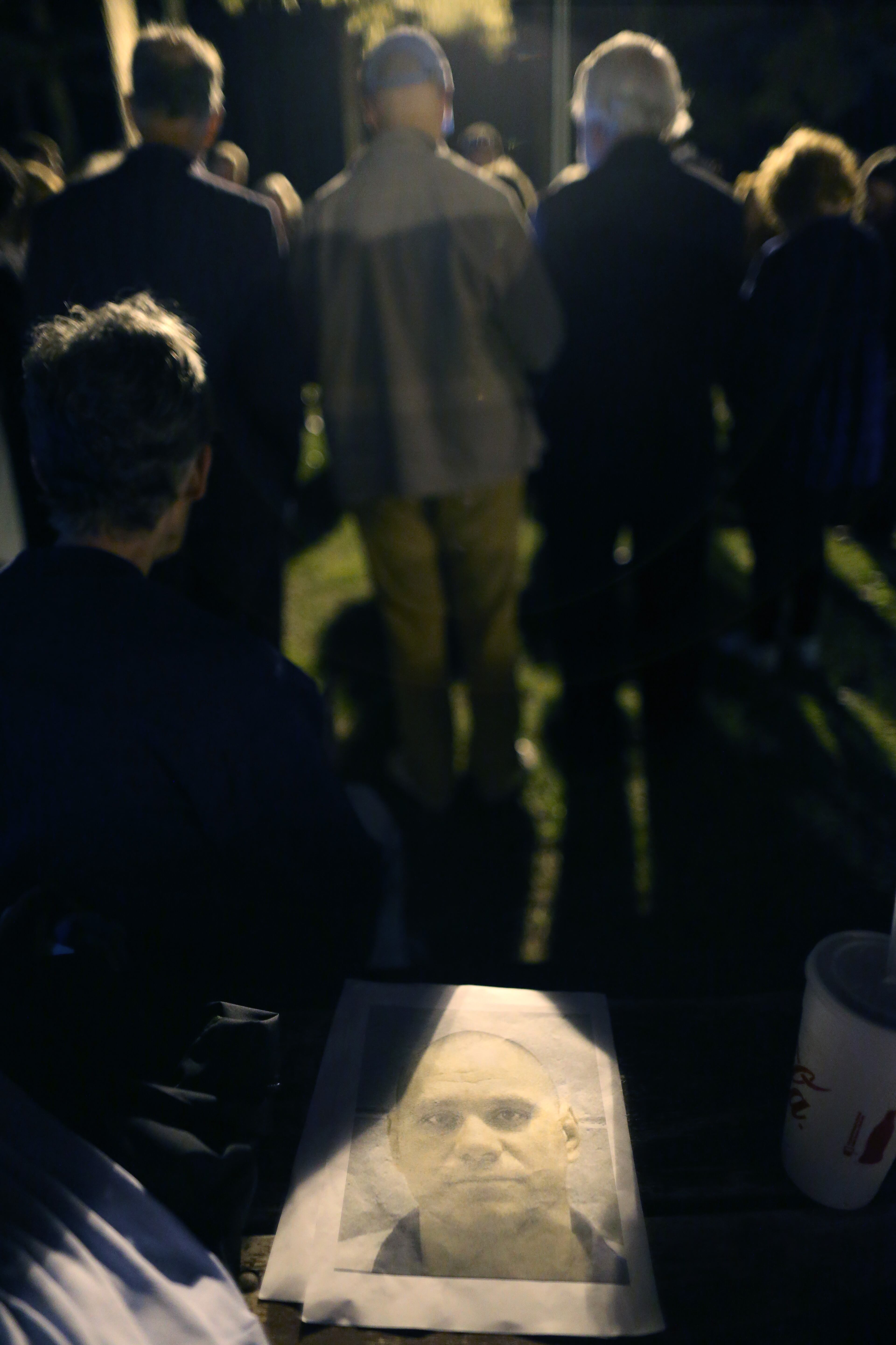 A photo of Joshua Bishop rests on a table while death penalty opponents gather to pray outside of the Georgia Diagnostic and Classification State Prison in advance of Bishop's execution Thursday night, March 31, 2016. Ben Gray / bgray@ajc.com