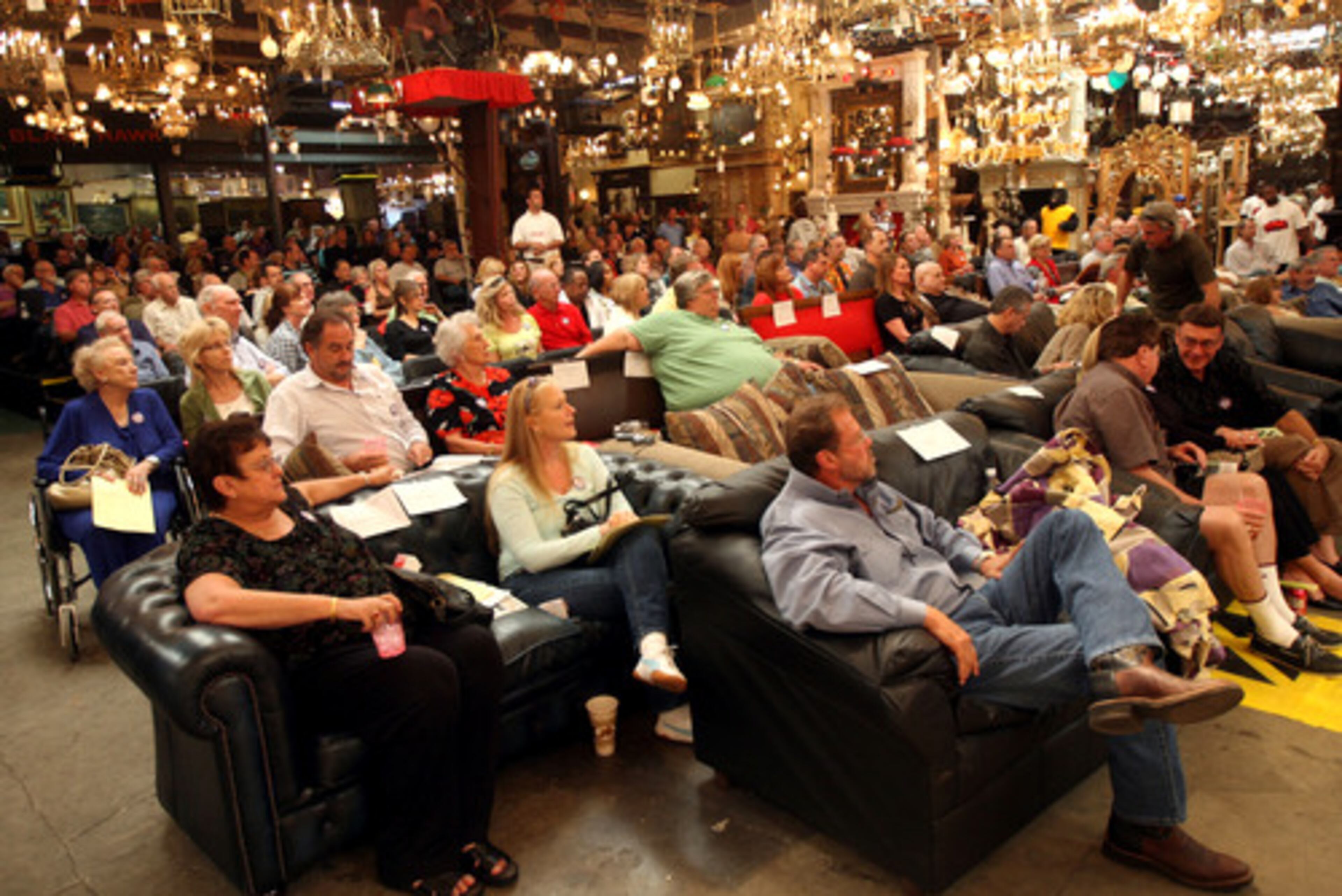 Food and drinks are served during the two-day auction, creating a party atmosphere.