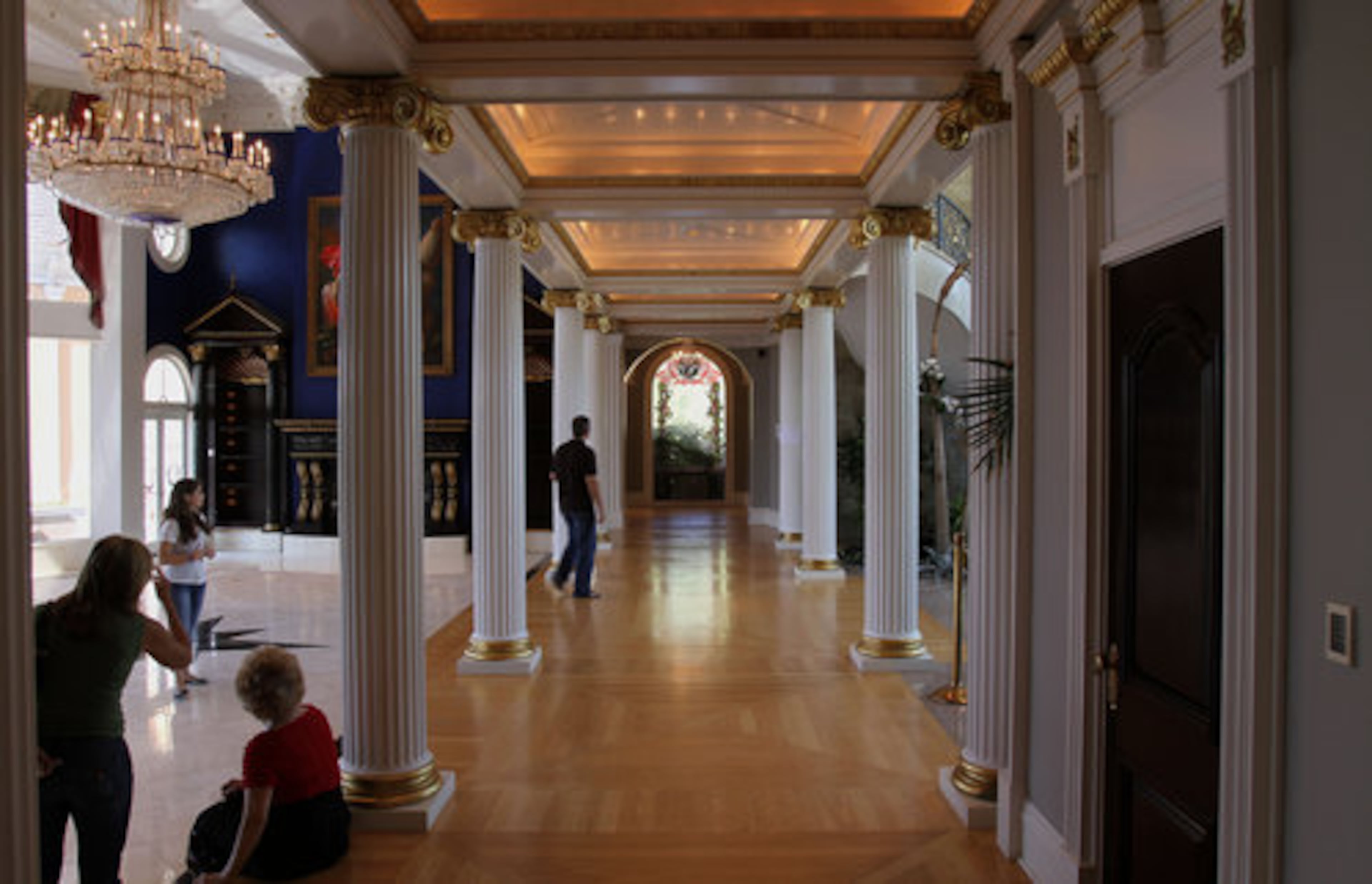 Bidders tour the terrace level of Dean Gardens. Many items were up for bid during the live auction of Tyler Perry's Johns Creek home Sunday, Sept. 12, 2010.