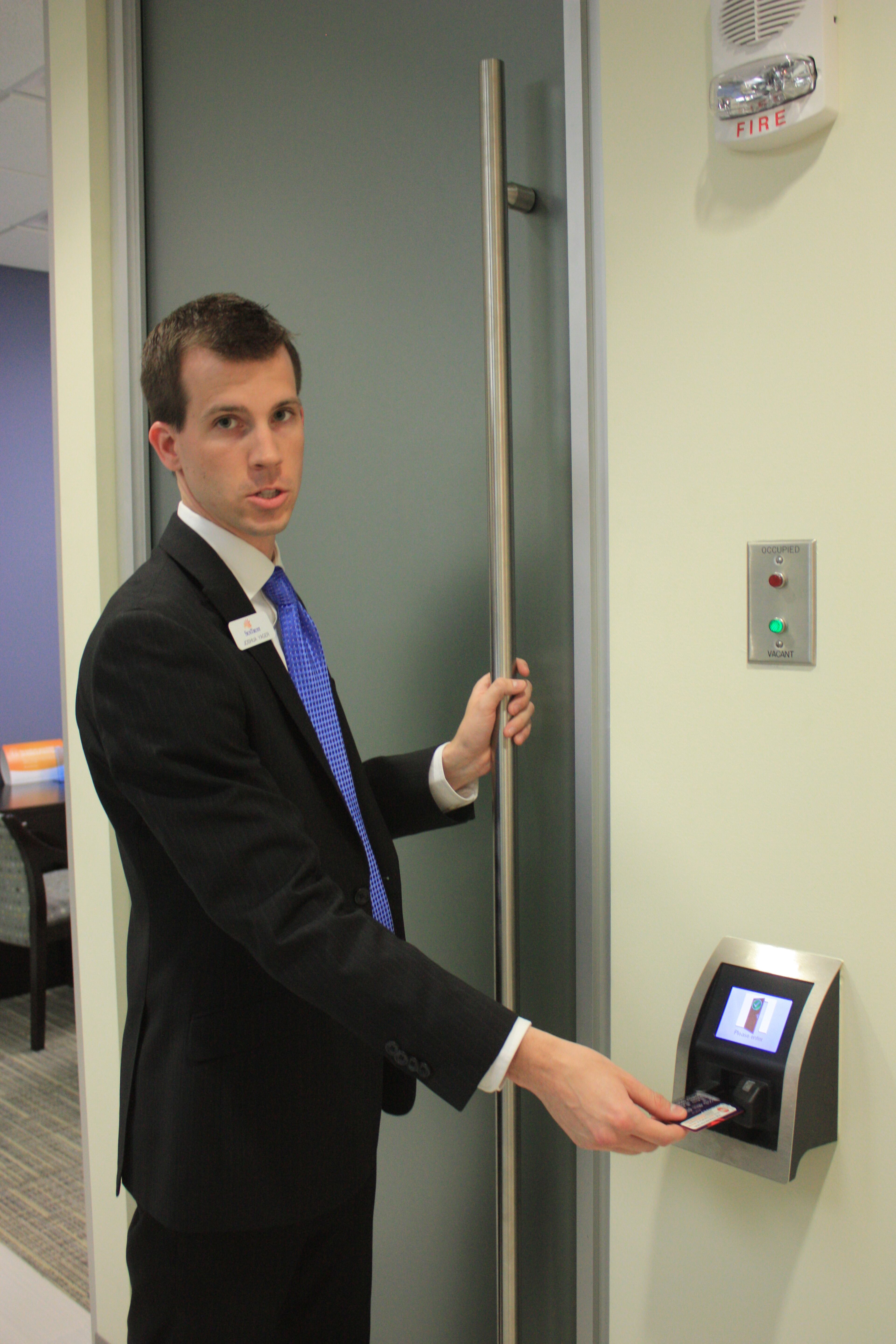 Unlike a traditional system, where a bank employee must accompany clients to the safe deposit vault, this one's self-service. Customers use their debit card or credit card to enter a room to get access to their safe deposit box.