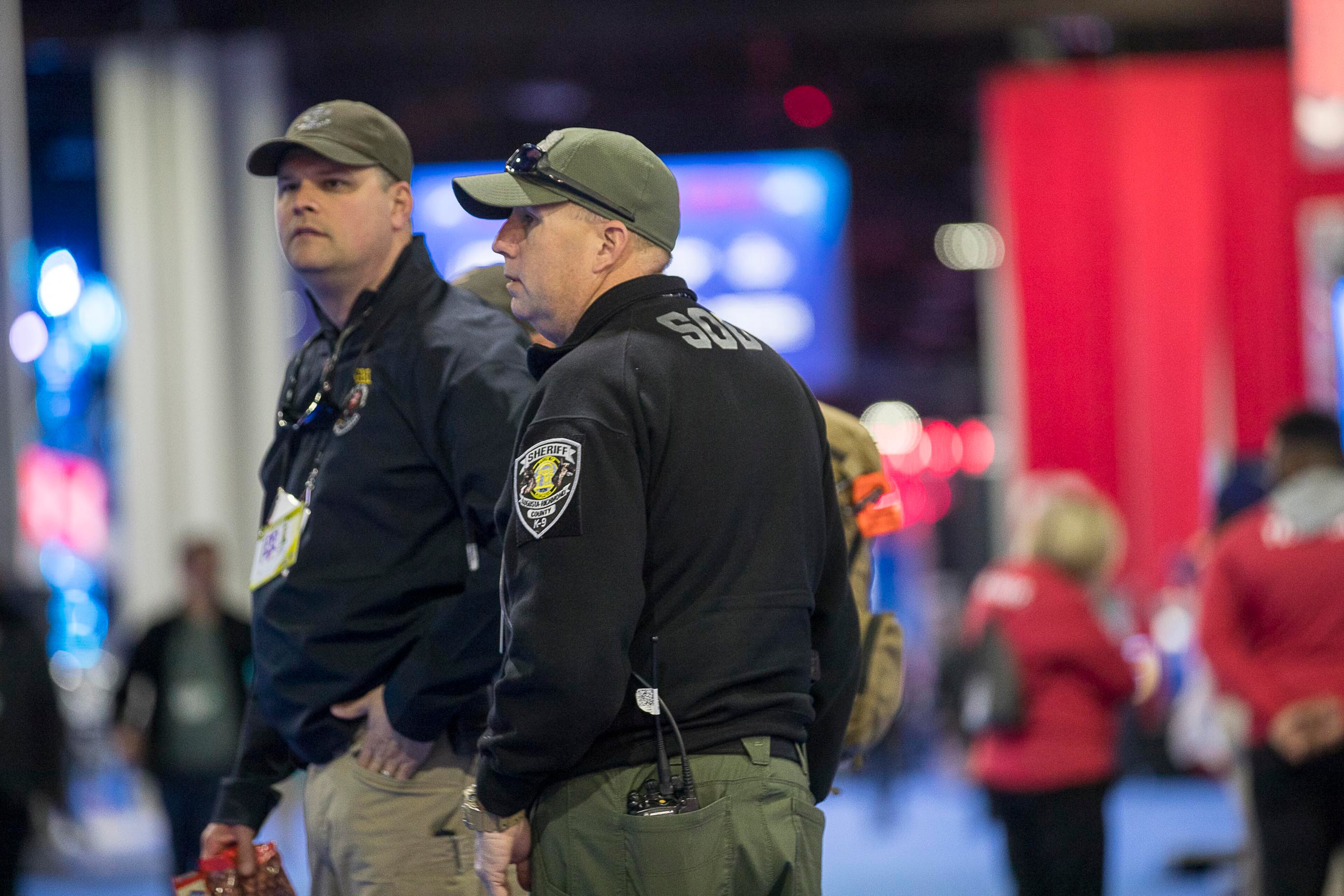 01/28/2019 -- Atlanta, Georgia -- August-Richmond County Sheriff's K-9 Officers canvass the Super Bowl LIII Fan experience concourse prior to it opening at the Georgia World Congress Center in Atlanta, Monday, January 28, 2019. (ALYSSA POINTER/ALYSSA.POINTER@AJC.COM)