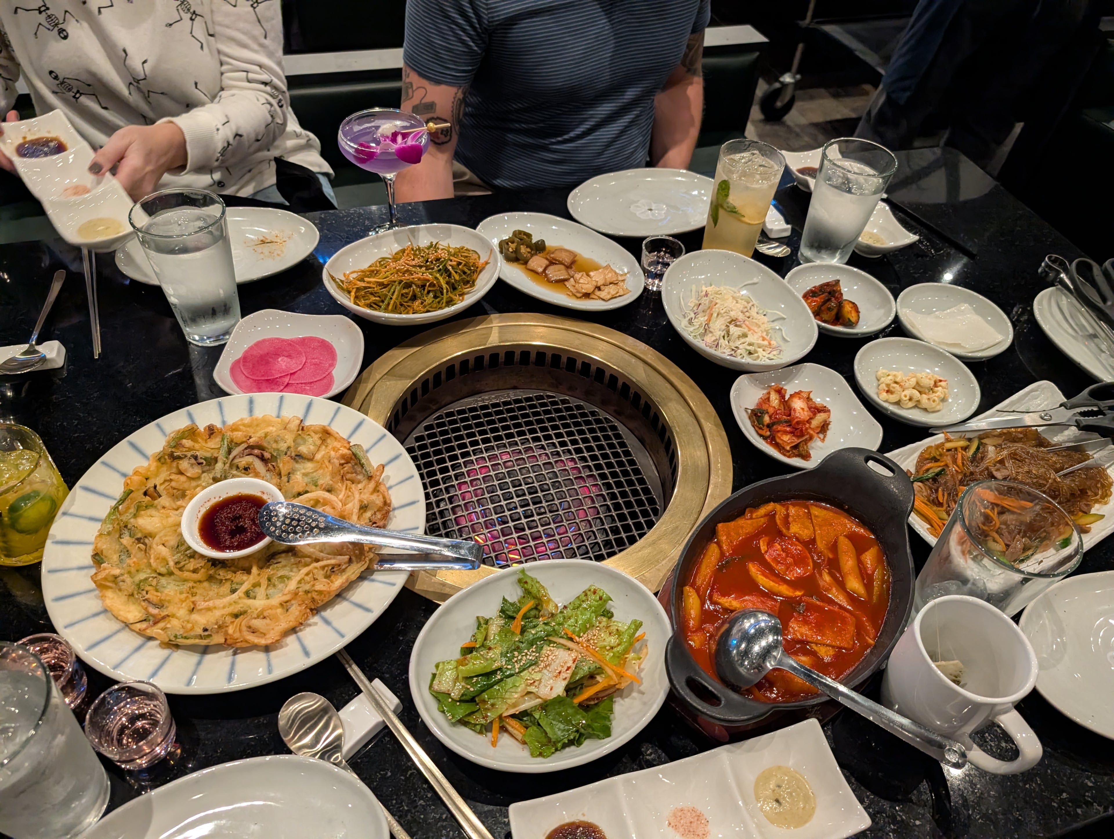 A full table at Bene Korean BBQ. (Su-Jit Lin for the AJC)