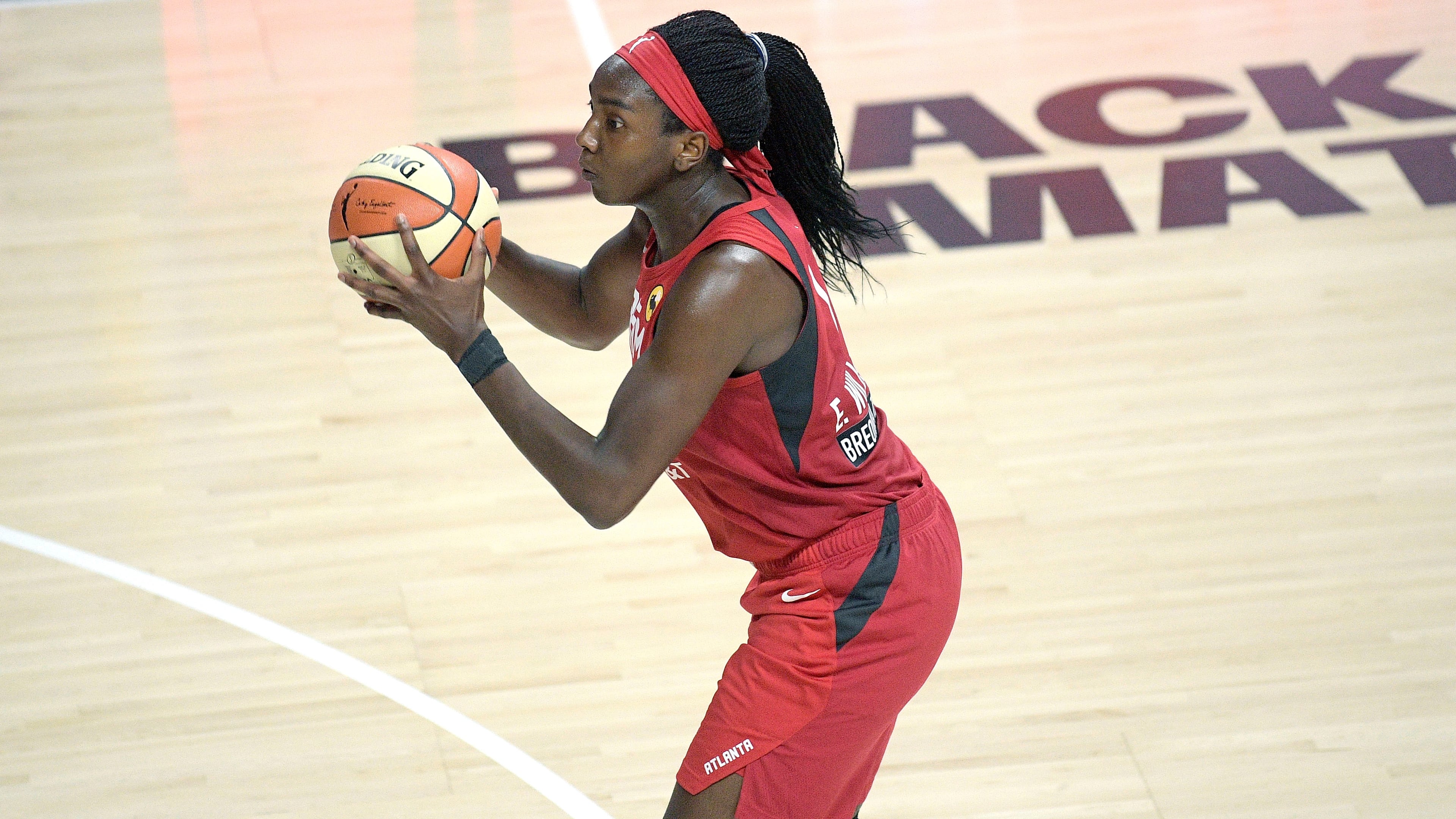 Atlanta Dream center Elizabeth Williams sets up for a shot during the second half of a WNBA basketball game against the Dallas Wings, Sunday, July 26, 2020, in Bradenton, Fla.